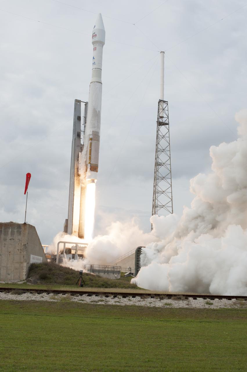 CAPE CANAVERAL, Fla. -- The United Launch Alliance Atlas V rocket carrying NASA's Mars Atmosphere and Volatile EvolutioN, or MAVEN, spacecraft rises off Space Launch Complex 41 on Cape Canaveral Air Force Station in Florida. Launch was on schedule at 1:28 p.m. EST Nov. 18 at the opening of a two-hour launch window. After a 10-month journey to the Red Planet, MAVEN will study its upper atmosphere in unprecedented detail from orbit above the planet. Built by Lockheed Martin in Littleton, Colo., MAVEN will arrive at Mars in September 2014 and will be inserted into an elliptical orbit with a high point of 3,900 miles, swooping down to as close as 93 miles above the planet's surface. For more information, visit: http://www.nasa.gov/mission_pages/maven/main/index.html. Photo credit: NASA/Tony Gray and Rick Wetherington