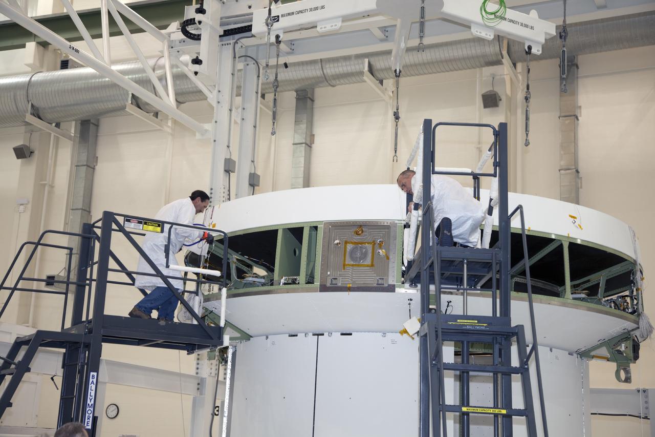 CAPE CANAVERAL, Fla. -- Inside the Operations and Checkout Building high bay at NASA’s Kennedy Space Center in Florida, prepare the service module bulkhead for the Orion spacecraft for the move to a lifting station. The service module will be mated to the spacecraft adapter cone for testing. Orion is the exploration spacecraft designed to carry astronauts to destinations not yet explored by humans, including an asteroid and Mars. It will have emergency abort capability, sustain the crew during space travel and provide safe re-entry from deep space return velocities. The first unpiloted test flight of the Orion is scheduled to launch in 2014 atop a Delta IV rocket and in 2017 on NASA’s Space Launch System rocket. For more information, visit http://www.nasa.gov/orion. Photo credit: NASA/Daniel Casper