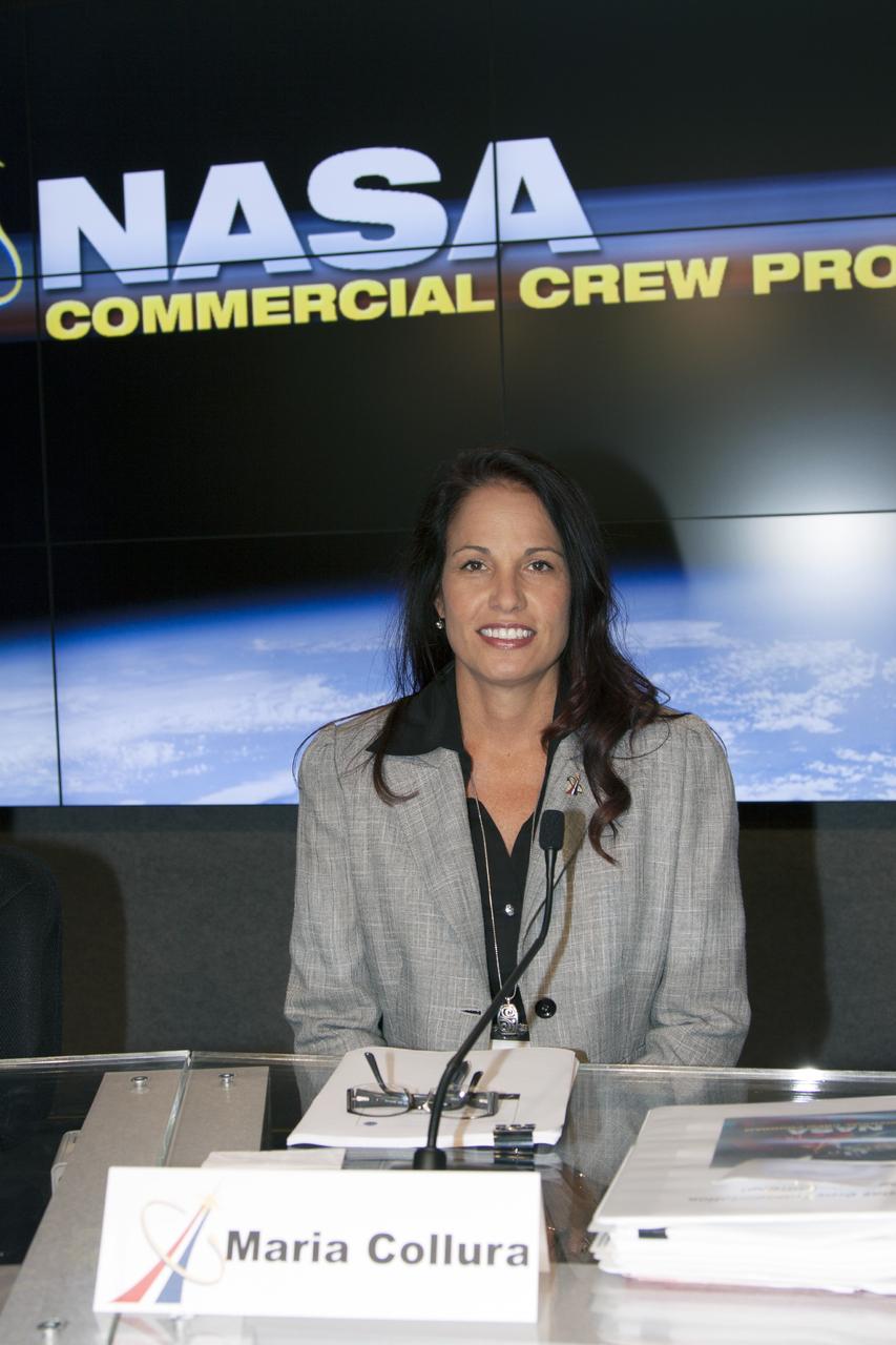 CAPE CANAVERAL, Fla. – Maria Collura of NASA's Commercial Crew Program is seen before the start of an industry conference inside the Television Auditorium at NASA's Kennedy Space Center in Florida. The conference was held following the program's request for proposals from commercial companies for a development and certification contract called the Commercial Crew Transportation Capability CCtCap. The contract will provide a finish line for the agency following more than four years of development work by CCP and American aerospace companies. CCtCap is the second phase of a two-phase certification plan for privately built and operated integrated crew transportation systems. Photo credit: NASA/Jim Grossmann