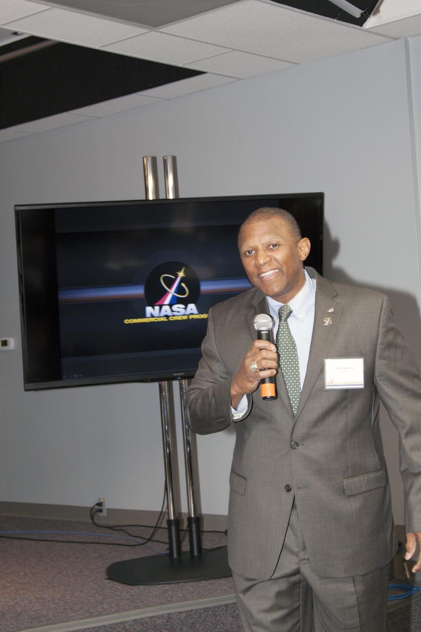 CAPE CANAVERAL, Fla. – Kelvin Manning, associate director of NASA's Kennedy Space Center in Florida, welcomes participants to an industry conference inside the Television Auditorium at Kennedy. The conference was held following the program's request for proposals from commercial companies for a development and certification contract called the Commercial Crew Transportation Capability CCtCap. The contract will provide a finish line for the agency following more than four years of development work by CCP and American aerospace companies. CCtCap is the second phase of a two-phase certification plan for privately built and operated integrated crew transportation systems. Photo credit: NASA/Jim Grossmann