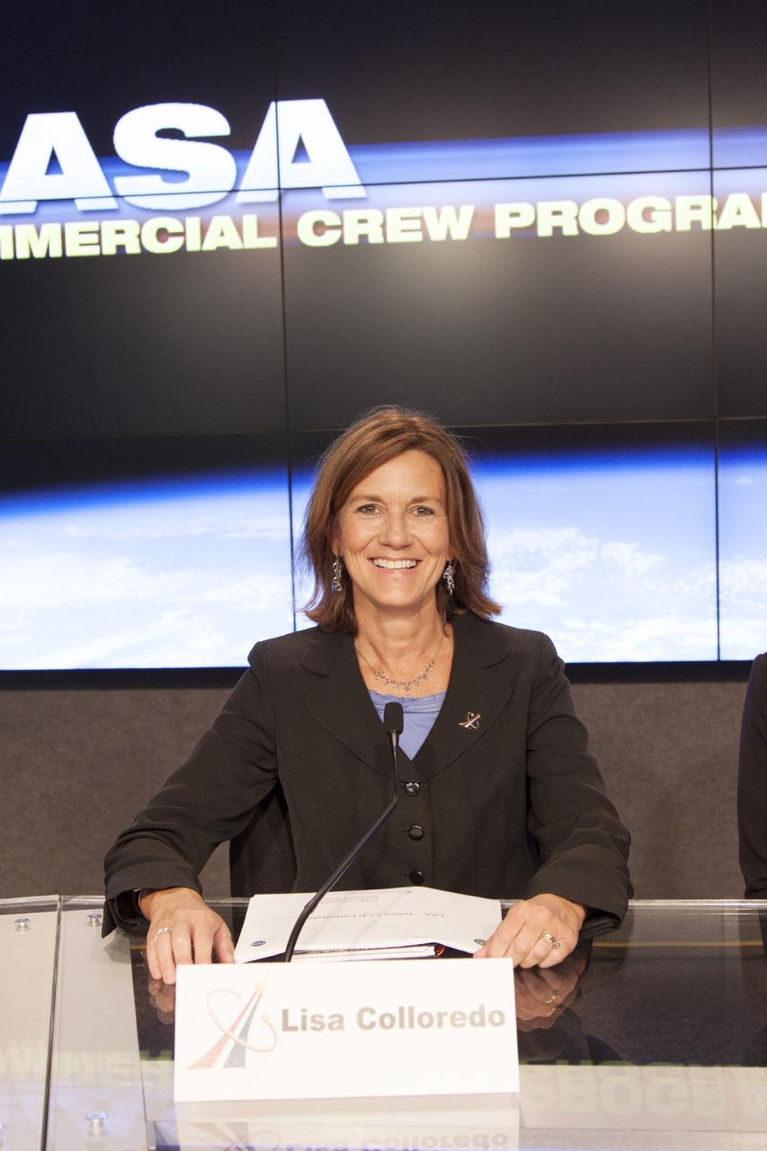 CAPE CANAVERAL, Fla. – Lisa Colloredo, associate program manager of NASA's Commercial Crew Program and a panelist of the Commercial Crew Transportation Capability, or CCtCap, Pre-Proposal Conference, is seen before the start of an industry conference inside the Television Auditorium at NASA's Kennedy Space Center in Florida. The conference was held following the Commercial Crew Program, or CCP, request for proposals from commercial companies for a development and certification contract under CCtCap. The contract will provide a finish line for the agency following more than four years of development work by CCP and American aerospace companies. CCtCap is the second phase of a two-phase certification plan for privately built and operated integrated crew transportation systems. CCP’s goal is to aid in the development of commercial capabilities for crew transportation and rescue services to and from the International Space Station and other low-Earth orbit destinations by the end of 2017. Photo credit: NASA/Jim Grossmann