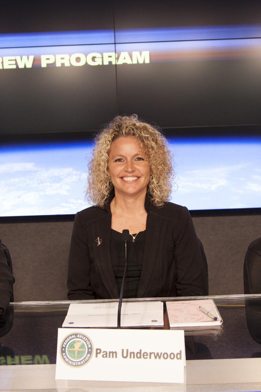 CAPE CANAVERAL, Fla. – Pam Underwood of the Federal Aviation Administration's Office of Commercial Transportation and a panelist of the Commercial Crew Transportation Capability, or CCtCap, Pre-Proposal Conference, is seen before the start of an industry conference inside the Television Auditorium at NASA's Kennedy Space Center in Florida. The conference was held following the Commercial Crew Program, or CCP, request for proposals from commercial companies for a development and certification contract under CCtCap. The contract will provide a finish line for the agency following more than four years of development work by CCP and American aerospace companies. CCtCap is the second phase of a two-phase certification plan for privately built and operated integrated crew transportation systems. CCP’s goal is to aid in the development of commercial capabilities for crew transportation and rescue services to and from the International Space Station and other low-Earth orbit destinations by the end of 2017. Photo credit: NASA/Jim Grossmann