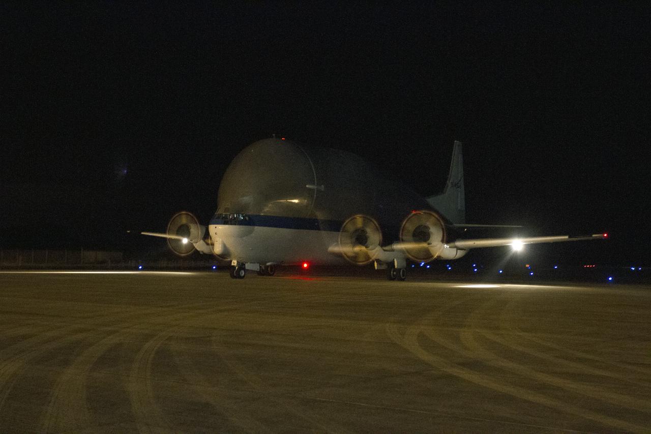 CAPE CANAVERAL, Fla. – At the Shuttle Landing Facility at NASA's Kennedy Space Center in Florida, the heat shield for the agency's Orion spacecraft arrived aboard the Super Guppy aircraft. The largest of its kind ever built, the heat shield is planned for installation on the Orion crew module in March next year. The Orion spacecraft is scheduled to make its first unpiloted flight test, Exploration Flight Test-1 EFT-1, in September 2014.      The Orion spacecraft is designed to meet requirements for traveling beyond low-Earth orbit. The spacecraft will serve as the exploration vehicle that will carry crews to space, sustain the astronauts during the space travel and provide safe re-entry from deep space. For more information, visit: http://www.nasa.gov/orion Photo credit: NASA/Cory Huston