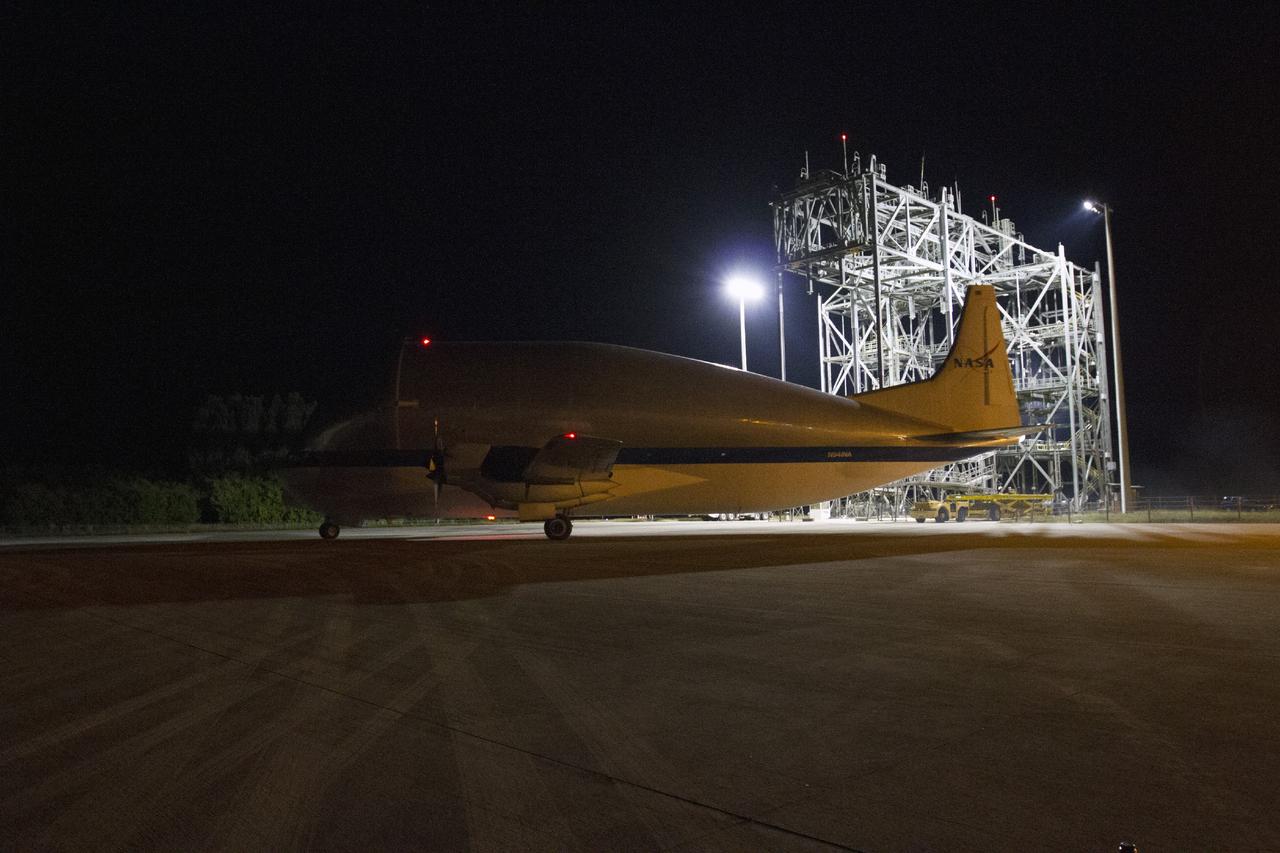 CAPE CANAVERAL, Fla. – At the Shuttle Landing Facility at NASA's Kennedy Space Center in Florida, the heat shield for the agency's Orion spacecraft arrived aboard the Super Guppy aircraft. The largest of its kind ever built, the heat shield is planned for installation on the Orion crew module in March next year. The Orion spacecraft is scheduled to make its first unpiloted flight test, Exploration Flight Test-1 EFT-1, in September 2014.      The Orion spacecraft is designed to meet requirements for traveling beyond low-Earth orbit. The spacecraft will serve as the exploration vehicle that will carry crews to space, sustain the astronauts during the space travel and provide safe re-entry from deep space. For more information, visit: http://www.nasa.gov/orion Photo credit: NASA/Cory Huston