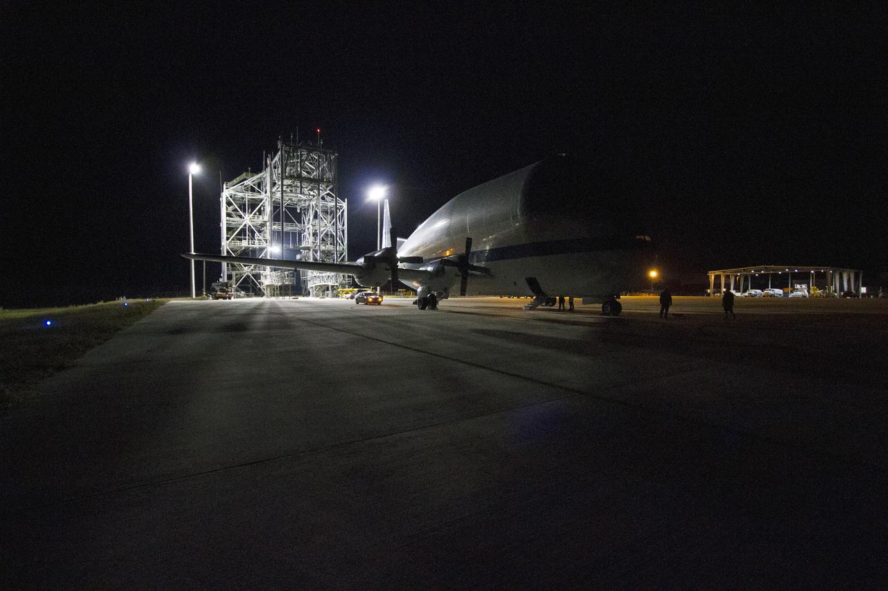 CAPE CANAVERAL, Fla. – At the Shuttle Landing Facility at NASA's Kennedy Space Center in Florida, the heat shield for the agency's Orion spacecraft arrived aboard the Super Guppy aircraft. The largest of its kind ever built, the heat shield is planned for installation on the Orion crew module in March next year. The Orion spacecraft is scheduled to make its first unpiloted flight test, Exploration Flight Test-1 EFT-1, in September 2014.      The Orion spacecraft is designed to meet requirements for traveling beyond low-Earth orbit. The spacecraft will serve as the exploration vehicle that will carry crews to space, sustain the astronauts during the space travel and provide safe re-entry from deep space. For more information, visit: http://www.nasa.gov/orion Photo credit: NASA/Cory Huston
