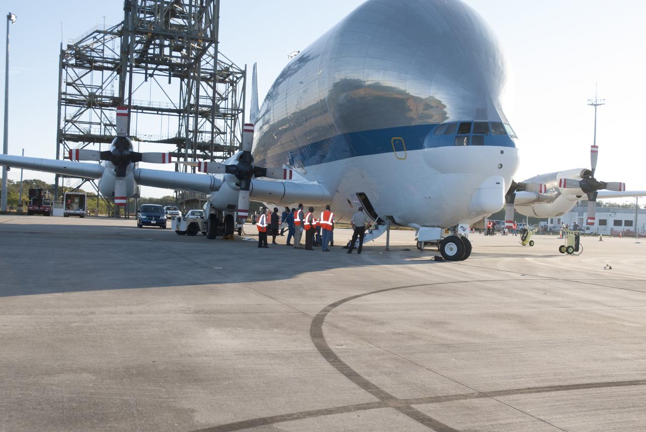 CAPE CANAVERAL, Fla. – At the Shuttle Landing Facility at NASA's Kennedy Space Center in Florida, the heat shield for the agency's Orion spacecraft arrived aboard the Super Guppy aircraft. The largest of its kind ever built, the heat shield is planned for installation on the Orion crew module in March next year. The Orion spacecraft is scheduled to make its first unpiloted flight test, Exploration Flight Test-1 EFT-1, in September 2014.    The Orion spacecraft is designed to meet requirements for traveling beyond low-Earth orbit. The spacecraft will serve as the exploration vehicle that will carry crews to space, sustain the astronauts during the space travel and provide safe re-entry from deep space. For more information, visit: http://www.nasa.gov/orion Photo credit: NASA/Charisse Nasher