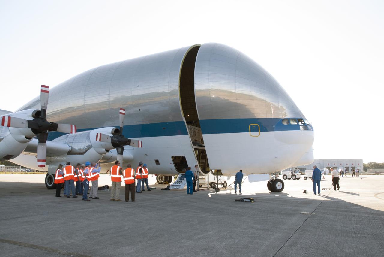 CAPE CANAVERAL, Fla. – At the Shuttle Landing Facility at NASA's Kennedy Space Center in Florida, technicians begin the process to offload the heat shield for the agency's Orion spacecraft from the Super Guppy aircraft. The largest of its kind ever built, the heat shield is planned for installation on the Orion crew module in March of next year. The Orion spacecraft is scheduled to make its first unpiloted flight test, Exploration Flight Test-1 EFT-1, in September 2014.    The Orion spacecraft is designed to meet requirements for traveling beyond low-Earth orbit. The spacecraft will serve as the exploration vehicle that will carry crews to space, sustain the astronauts during the space travel and provide safe re-entry from deep space. For more information, visit: http://www.nasa.gov/orion Photo credit: NASA/Charisse Nasher