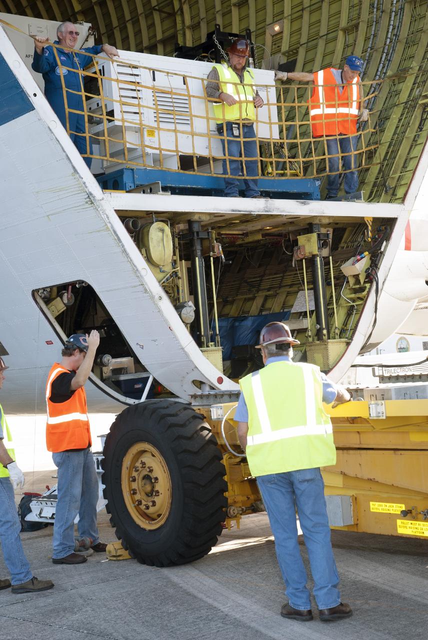 CAPE CANAVERAL, Fla. – At the Shuttle Landing Facility at NASA's Kennedy Space Center in Florida, the heat shield for the agency's Orion spacecraft is being offloaded from the Super Guppy aircraft. The largest of its kind ever built, the heat shield is planned for installation on the Orion crew module in March of next year. The Orion spacecraft is scheduled to make its first unpiloted flight test, Exploration Flight Test-1 EFT-1, in September 2014.    The Orion spacecraft is designed to meet requirements for traveling beyond low-Earth orbit. The spacecraft will serve as the exploration vehicle that will carry crews to space, sustain the astronauts during the space travel and provide safe re-entry from deep space. For more information, visit: http://www.nasa.gov/orion Photo credit: NASA/Charisse Nasher