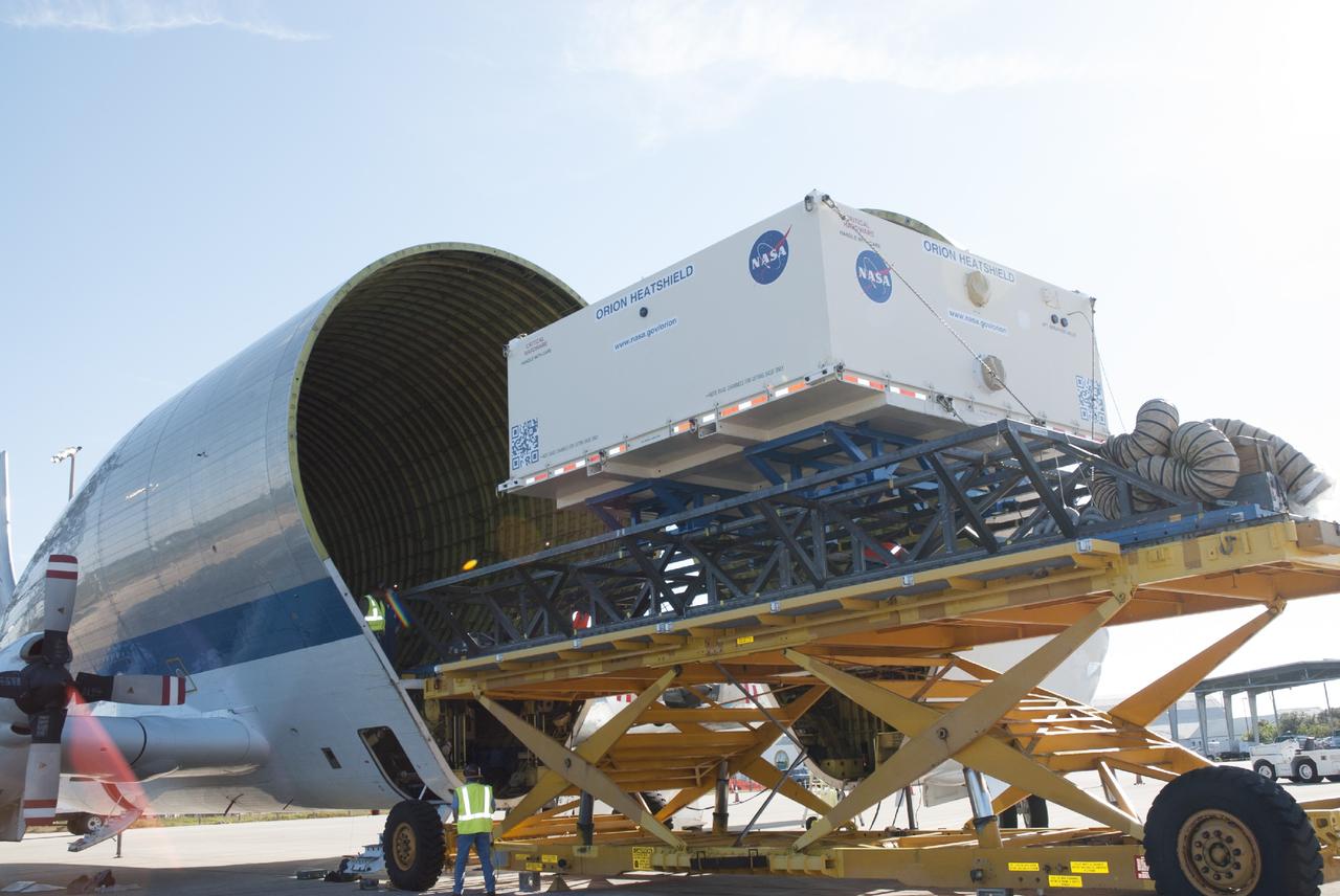 CAPE CANAVERAL, Fla. – At the Shuttle Landing Facility at NASA's Kennedy Space Center in Florida, the heat shield for the agency's Orion spacecraft is being offloaded from the Super Guppy aircraft. The largest of its kind ever built, the heat shield is planned for installation on the Orion crew module in March of next year. The Orion spacecraft is scheduled to make its first unpiloted flight test, Exploration Flight Test-1 EFT-1, in September 2014.    The Orion spacecraft is designed to meet requirements for traveling beyond low-Earth orbit. The spacecraft will serve as the exploration vehicle that will carry crews to space, sustain the astronauts during the space travel and provide safe re-entry from deep space. For more information, visit: http://www.nasa.gov/orion Photo credit: NASA/Charisse Nasher