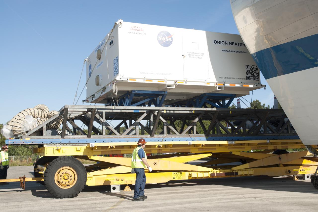 CAPE CANAVERAL, Fla. – At the Shuttle Landing Facility at NASA's Kennedy Space Center in Florida, the heat shield for the agency's Orion spacecraft is being offloaded from the Super Guppy aircraft. The largest of its kind ever built, the heat shield is planned for installation on the Orion crew module in March of next year. The Orion spacecraft is scheduled to make its first unpiloted flight test, Exploration Flight Test-1 EFT-1, in September 2014.      The Orion spacecraft is designed to meet requirements for traveling beyond low-Earth orbit. The spacecraft will serve as the exploration vehicle that will carry crews to space, sustain the astronauts during the space travel and provide safe re-entry from deep space. For more information, visit: http://www.nasa.gov/orion Photo credit: NASA/Charisse Nasher