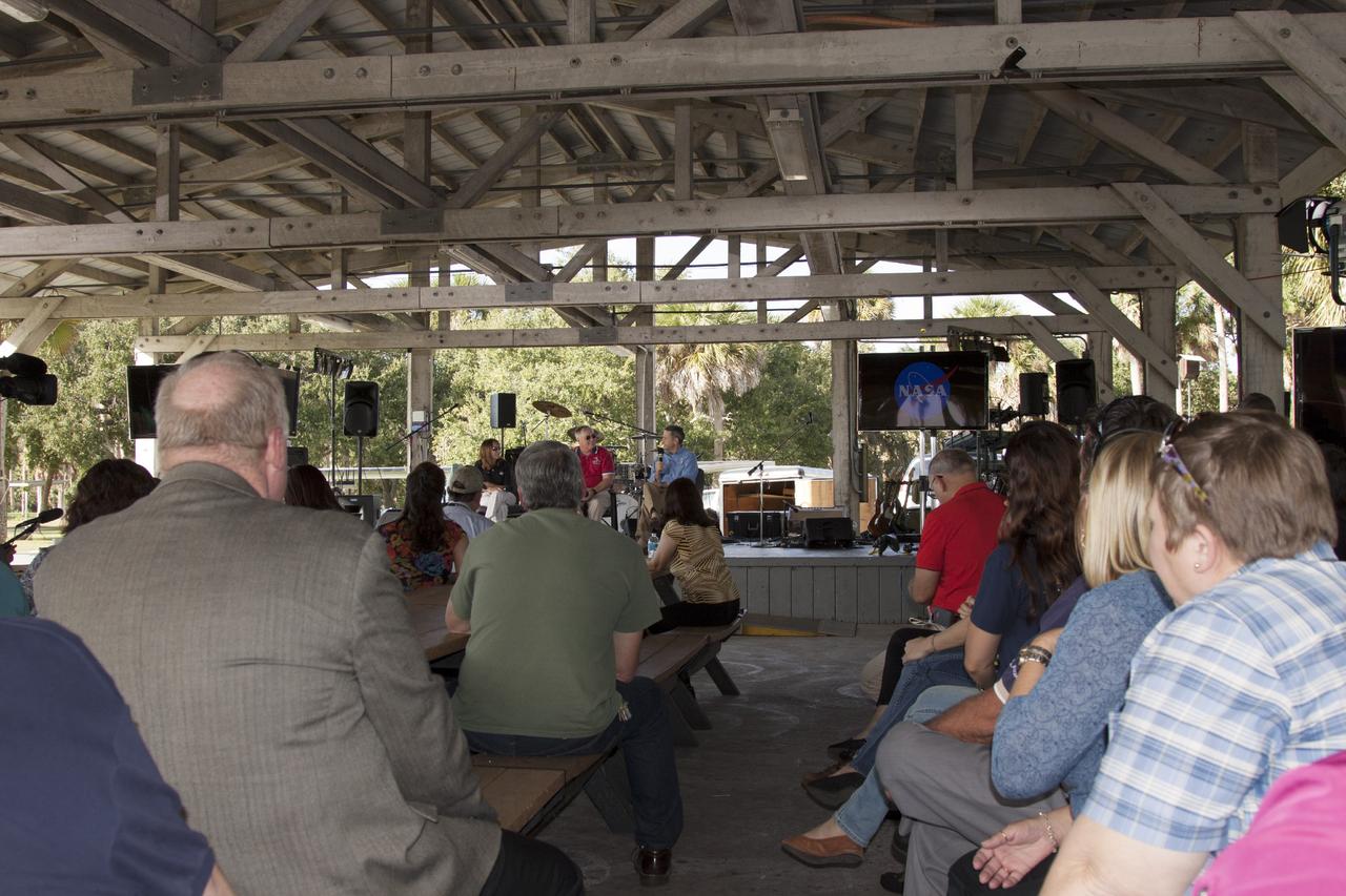 CAPE CANAVERAL, Fla. – At NASA's Kennedy Space Center in Florida, three members of the STS-88 space shuttle crew speak to spaceport employees during a celebration commemorating the 15th anniversary of the start of assembly of the International Space Station. On stage, from the left, are mission specialist Nancy Currie and Jerry Ross, along with and mission commander Bob Cabana, who is Kennedy's director. The Russian Space Agency's Functional Cargo Block, named "Zarya," was launched from the Baikonur Cosmodrome in Kazakhstan on Nov. 20, 1998. Two weeks later, on Dec. 4, 1998, the space shuttle Endeavour lifted off from Kennedy on STS-88 with node 1, called "Unity." In addition to Cabana, Curie and Ross, the crew also included pilot Rick Sturckow, along with mission specialists Jim Newman and Sergei Krikalev, a Russian cosmonaut. For more information, visit: http://www.nasa.gov/mission_pages/station/main/index.html Photo credit: NASA/Jim Grossman