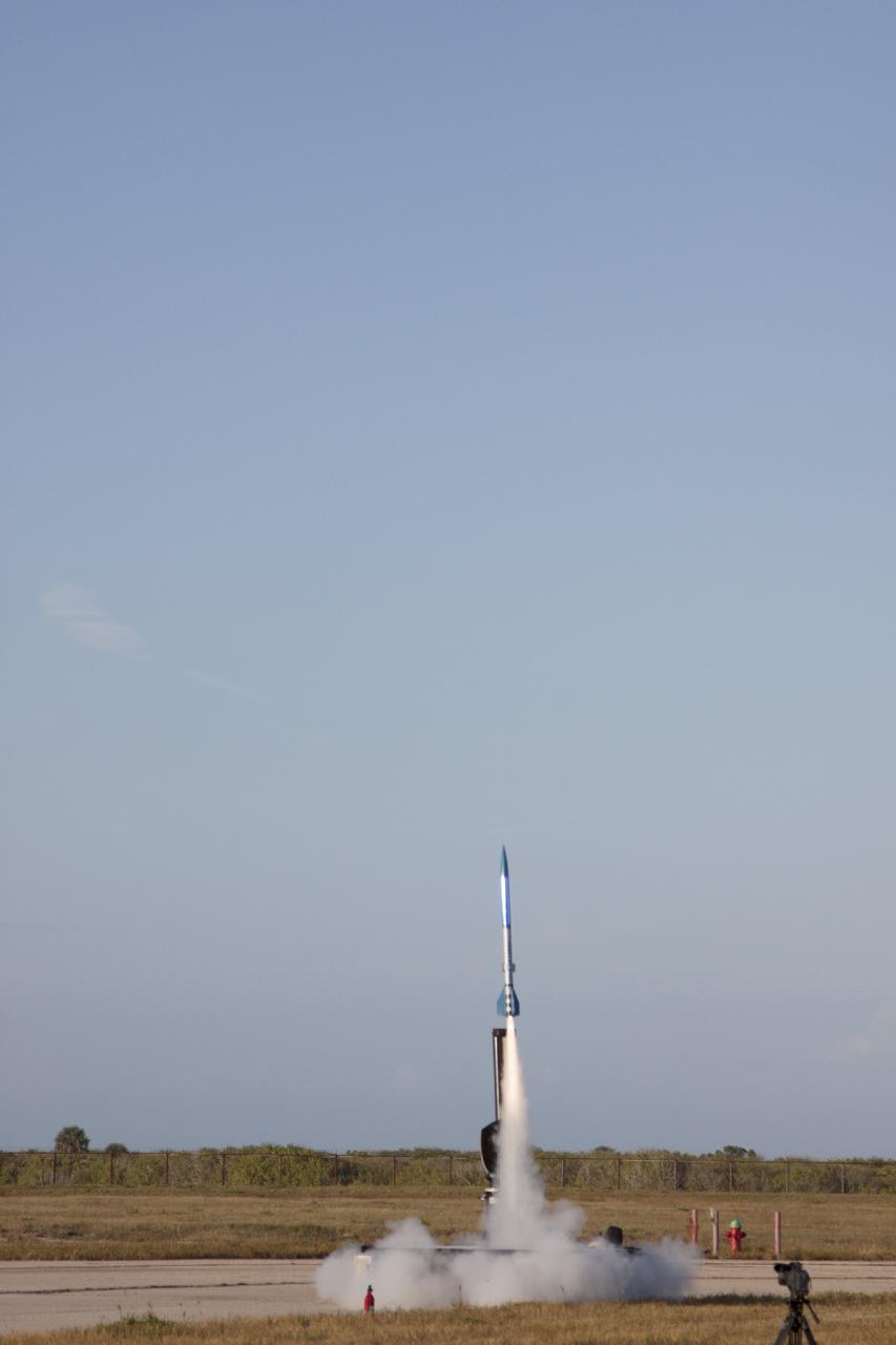 CAPE CANAVERAL, Fla. -- At NASA's Kennedy Space Center in Florida, a small rocket lifts off as part of Rocket University. The launch tests systems designed by the student engineers.    As part of Rocket University, the engineers are given an opportunity to work a fast-track project to develop skills in developing spacecraft systems of the future. As NASA plans for future spaceflight programs to low-Earth orbit and beyond, teams of engineers at Kennedy are gaining experience in designing and flying launch vehicle systems on a small scale. Four teams of five to eight members from Kennedy are designing rockets complete with avionics and recovery systems. Launch operations require coordination with federal agencies, just as they would with rockets launched in support of a NASA mission. Photo credit: NASA/Jim Grossmann
