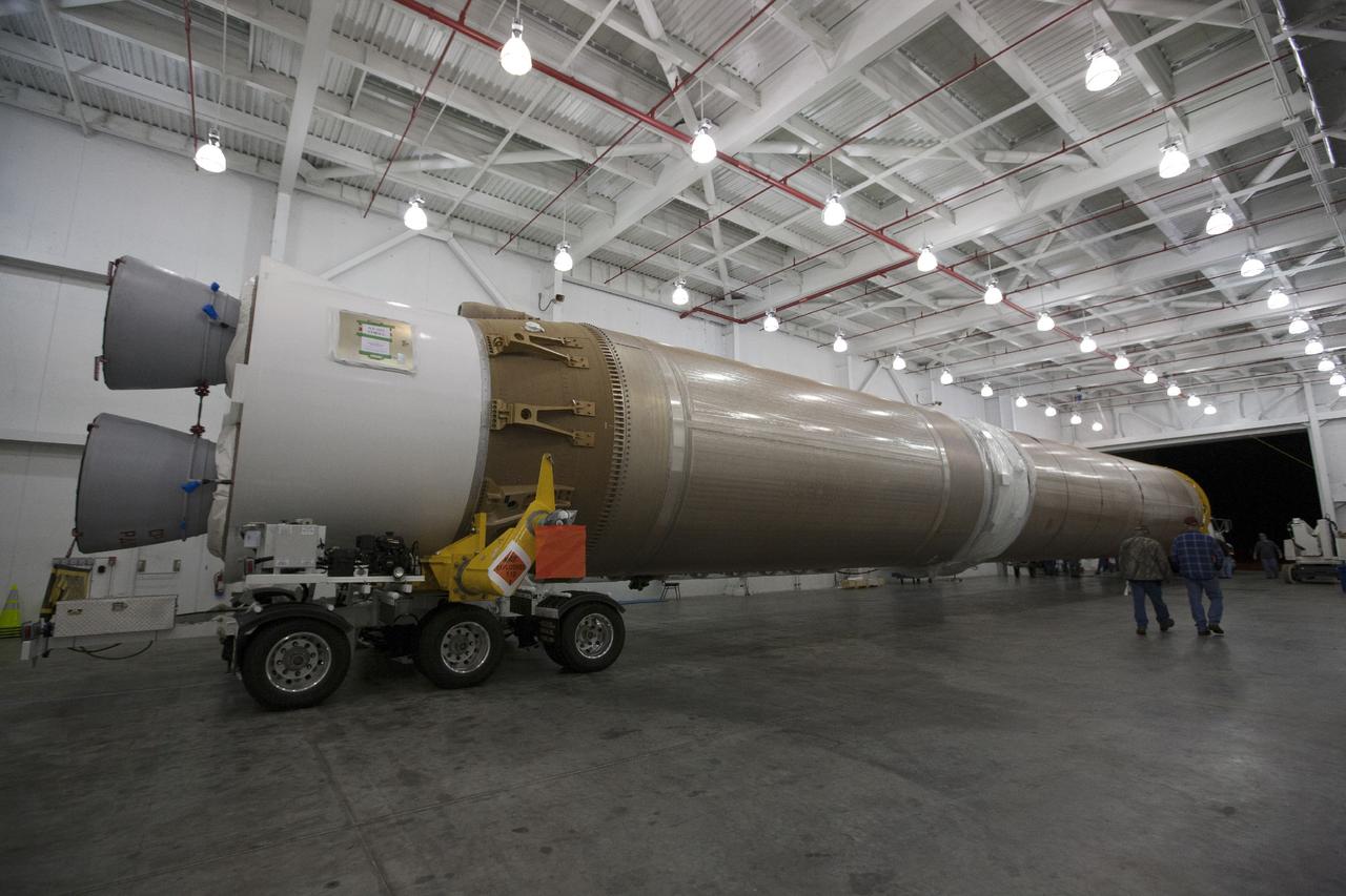 CAPE CANAVERAL, Fla. – The United Launch Alliance Atlas V first stage booster that will boost the Tracking and Data Relay Satellite, or TDRS-L, spacecraft into orbit is being transported from the hangar at the Atlas Spaceflight Operations Center on Cape Canaveral Air Force Station to Launch Complex 41. TDRS-L is the second of three next-generation satellites designed to ensure vital operational continuity for the NASA Space Network. It is scheduled to launch from Cape Canaveral's Space Launch Complex 41 atop an Atlas V rocket in January 2014. The current Tracking and Data Relay Satellite system consists of eight in-orbit satellites distributed to provide near continuous information relay service to missions such as the Hubble Space Telescope and International Space Station. For more information, visit: http://www.nasa.gov/content/tracking-and-data-relay-satellite-tdrs/ Photo credit: NASA/Kim Shiflett