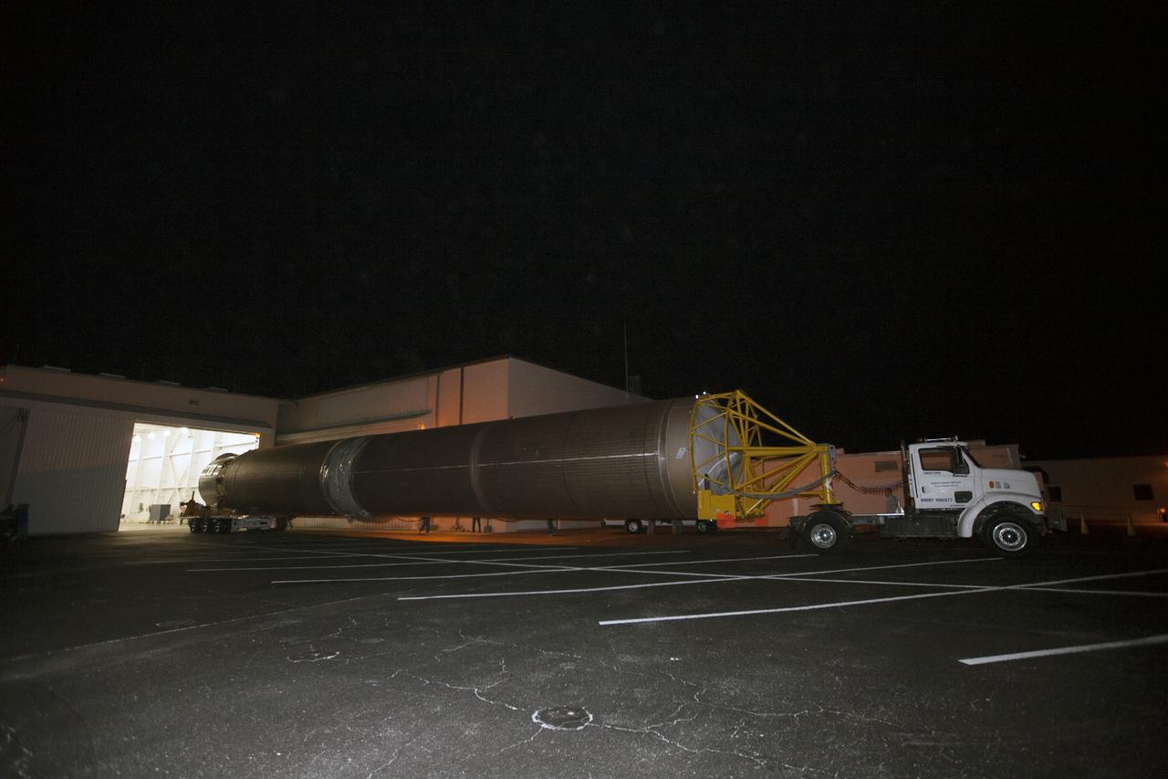 CAPE CANAVERAL, Fla. – The United Launch Alliance Atlas V first stage booster that will boost the Tracking and Data Relay Satellite, or TDRS-L, spacecraft into orbit is being transported from the hangar at the Atlas Spaceflight Operations Center on Cape Canaveral Air Force Station to Launch Complex 41. TDRS-L is the second of three next-generation satellites designed to ensure vital operational continuity for the NASA Space Network. It is scheduled to launch from Cape Canaveral's Space Launch Complex 41 atop an Atlas V rocket in January 2014. The current Tracking and Data Relay Satellite system consists of eight in-orbit satellites distributed to provide near continuous information relay service to missions such as the Hubble Space Telescope and International Space Station. For more information, visit: http://www.nasa.gov/content/tracking-and-data-relay-satellite-tdrs/ Photo credit: NASA/Kim Shiflett