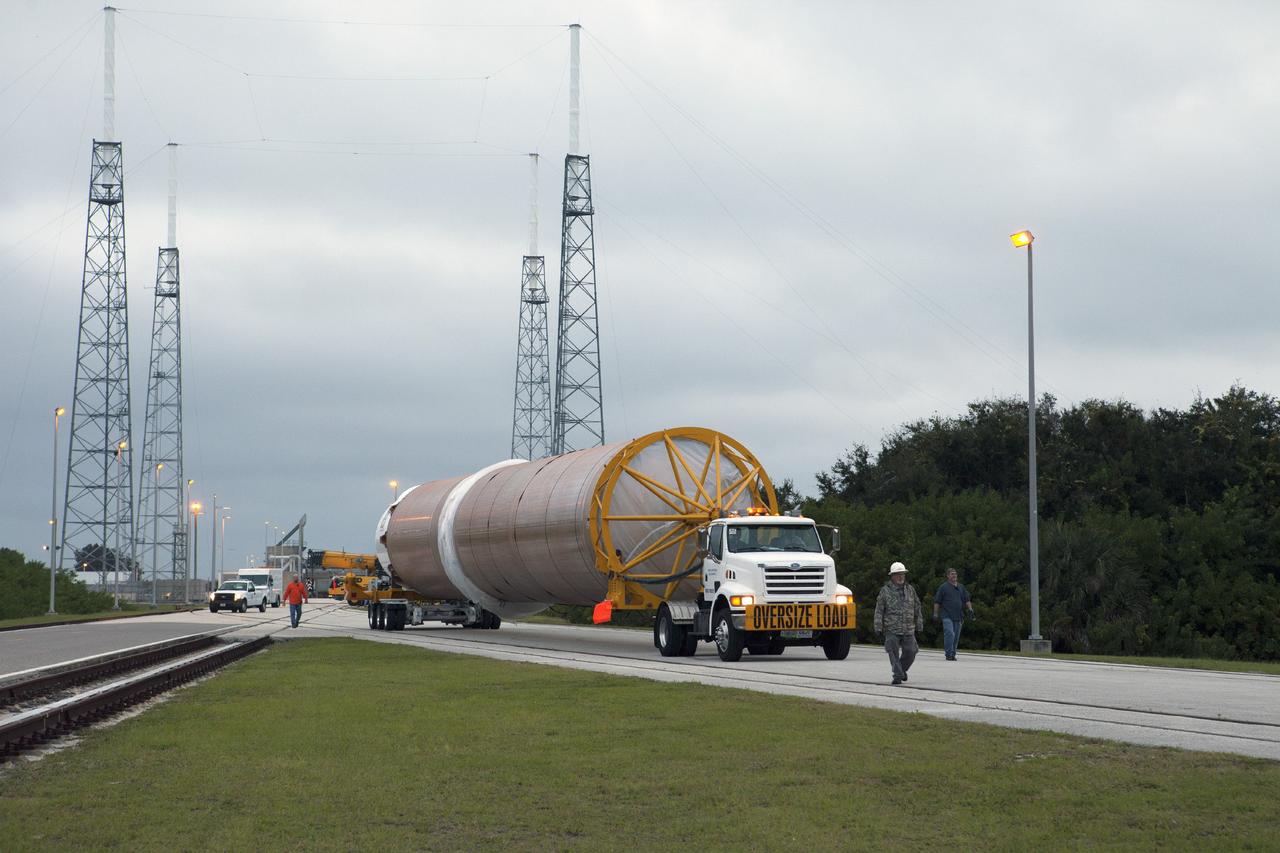CAPE CANAVERAL, Fla. – The United Launch Alliance Atlas V first stage booster that will boost the Tracking and Data Relay Satellite, or TDRS-L, spacecraft into orbit is being transported from the hangar at the Atlas Spaceflight Operations Center on Cape Canaveral Air Force Station to Launch Complex 41. TDRS-L is the second of three next-generation satellites designed to ensure vital operational continuity for the NASA Space Network. It is scheduled to launch from Cape Canaveral's Space Launch Complex 41 atop an Atlas V rocket in January 2014. The current Tracking and Data Relay Satellite system consists of eight in-orbit satellites distributed to provide near continuous information relay service to missions such as the Hubble Space Telescope and International Space Station. For more information, visit: http://www.nasa.gov/content/tracking-and-data-relay-satellite-tdrs/ Photo credit: NASA/Kim Shiflett