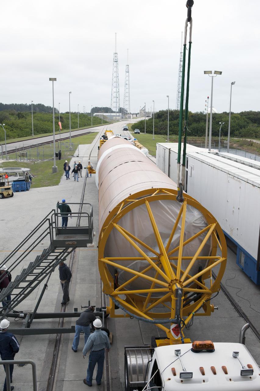 CAPE CANAVERAL, Fla. – The United Launch Alliance Atlas V first stage booster that will boost the Tracking and Data Relay Satellite, or TDRS-L, spacecraft into orbit arrives at Cape Canaveral Air Force Station's Launch Complex 41. TDRS-L is the second of three next-generation satellites designed to ensure vital operational continuity for the NASA Space Network. It is scheduled to launch from Cape Canaveral's Space Launch Complex 41 atop an Atlas V rocket in January 2014. The current Tracking and Data Relay Satellite system consists of eight in-orbit satellites distributed to provide near continuous information relay service to missions such as the Hubble Space Telescope and International Space Station. For more information, visit: http://www.nasa.gov/content/tracking-and-data-relay-satellite-tdrs/ Photo credit: NASA/Kim Shiflett