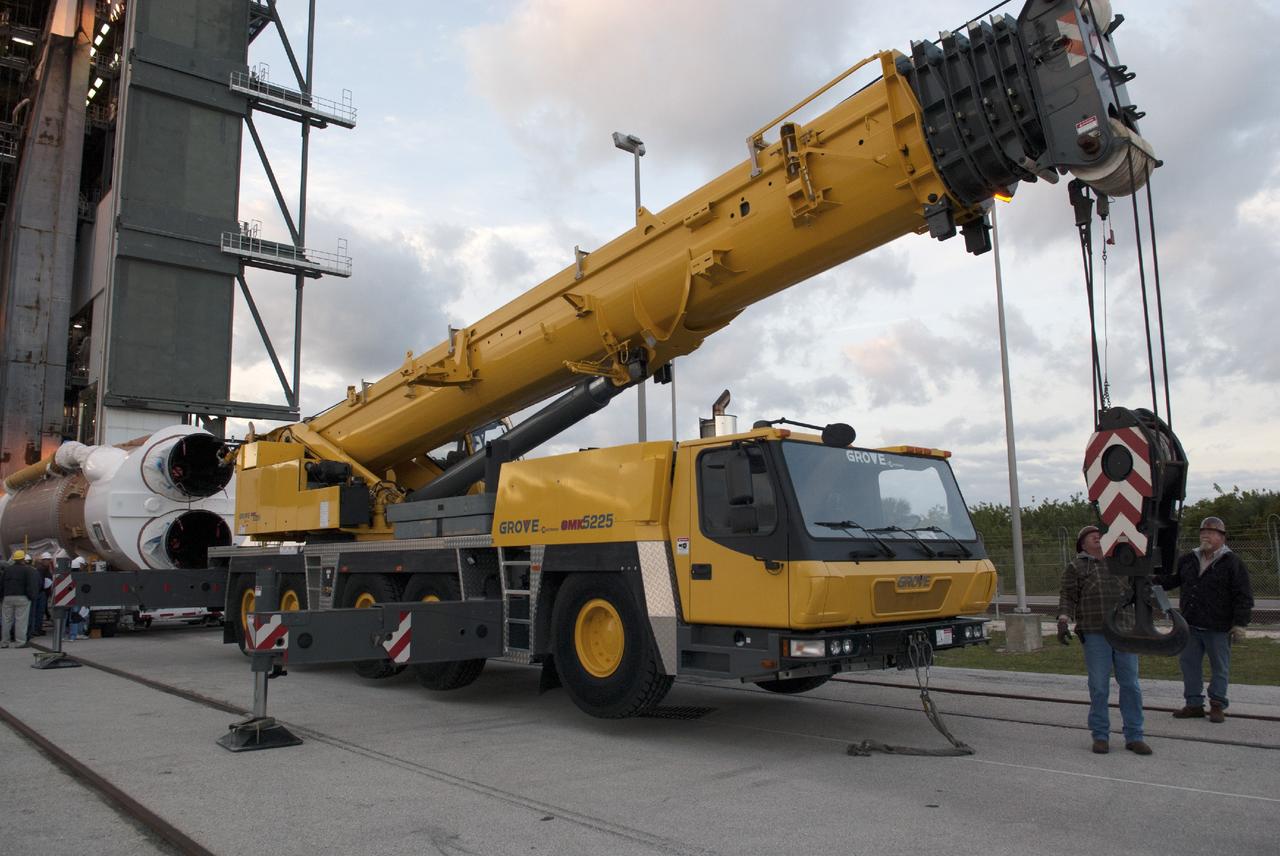 CAPE CANAVERAL, Fla. – At Cape Canaveral Air Force Station's Vertical Integration Facility at Launch Complex 41, a crane is positioned to support stacking of the United Launch Alliance Atlas V rocket that will boost the Tracking and Data Relay Satellite, or TDRS-L, spacecraft into orbit. TDRS-L is the second of three next-generation satellites designed to ensure vital operational continuity for the NASA Space Network. It is scheduled to launch from Cape Canaveral's Space Launch Complex 41 atop an Atlas V rocket in January 2014. The current Tracking and Data Relay Satellite system consists of eight in-orbit satellites distributed to provide near continuous information relay service to missions such as the Hubble Space Telescope and International Space Station. For more information, visit: http://www.nasa.gov/content/tracking-and-data-relay-satellite-tdrs/ Photo credit: NASA/Charisse Nahser