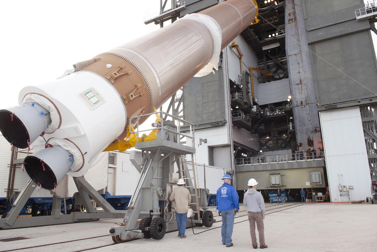 CAPE CANAVERAL, Fla. – At Cape Canaveral Air Force Station, the first stage of the United Launch Alliance Atlas V rocket is lifted for stacking in the Vertical Integration Facility at Launch Complex 41. The vehicle will be used to boost the Tracking and Data Relay Satellite, or TDRS-L, spacecraft to orbit. TDRS-L is the second of three next-generation satellites designed to ensure vital operational continuity for the NASA Space Network. It is scheduled to launch from Cape Canaveral's Space Launch Complex 41 atop an Atlas V rocket in January 2014. The current Tracking and Data Relay Satellite system consists of eight in-orbit satellites distributed to provide near continuous information relay service to missions such as the Hubble Space Telescope and International Space Station. For more information, visit: http://www.nasa.gov/content/tracking-and-data-relay-satellite-tdrs/ Photo credit: NASA/Charisse Nahser