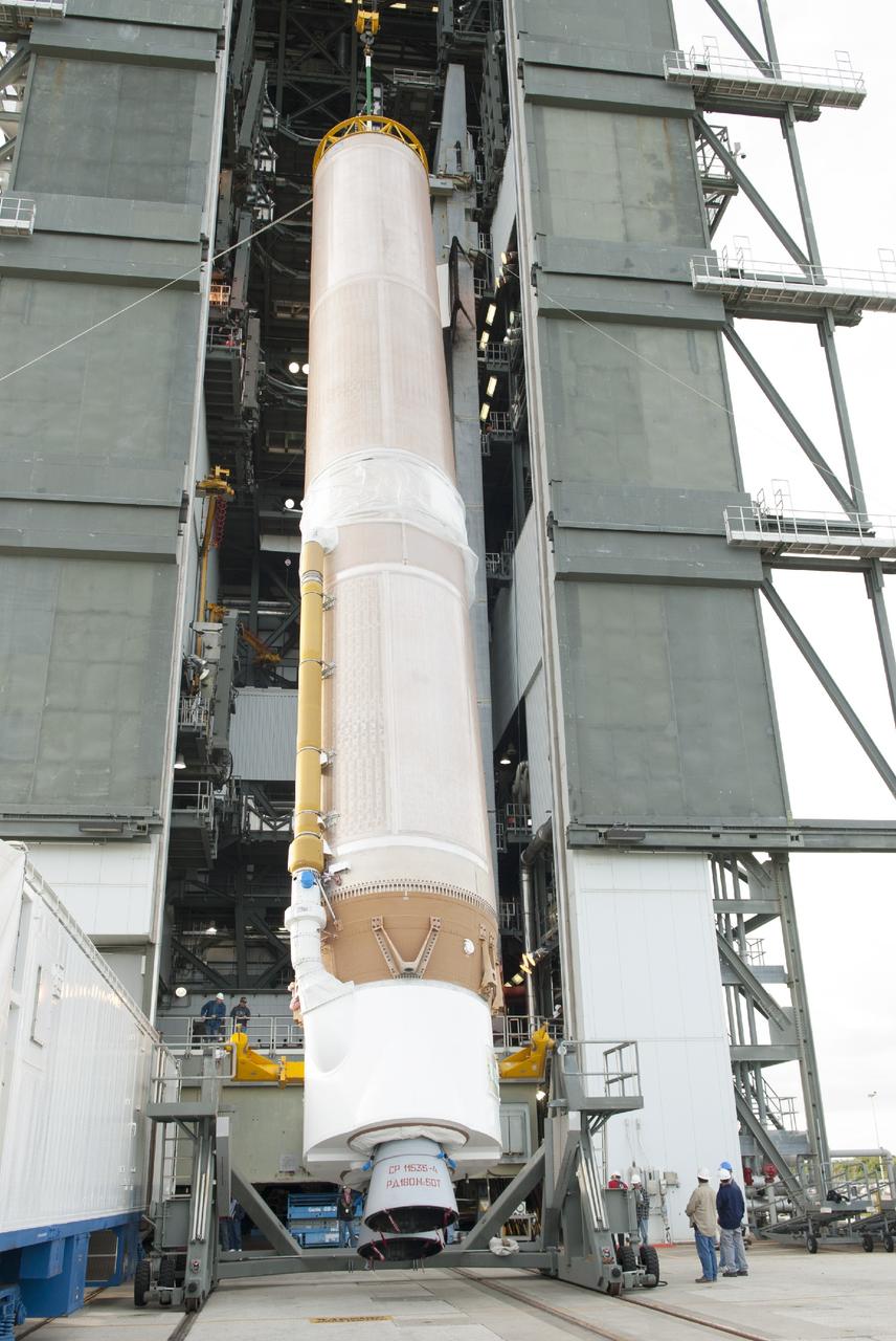 CAPE CANAVERAL, Fla. – At Cape Canaveral Air Force Station, the first stage of the United Launch Alliance Atlas V rocket is lifted for stacking in the Vertical Integration Facility at Launch Complex 41. The vehicle will be used to boost the Tracking and Data Relay Satellite, or TDRS-L, spacecraft to orbit. TDRS-L is the second of three next-generation satellites designed to ensure vital operational continuity for the NASA Space Network. It is scheduled to launch from Cape Canaveral's Space Launch Complex 41 atop an Atlas V rocket in January 2014. The current Tracking and Data Relay Satellite system consists of eight in-orbit satellites distributed to provide near continuous information relay service to missions such as the Hubble Space Telescope and International Space Station. For more information, visit: http://www.nasa.gov/content/tracking-and-data-relay-satellite-tdrs/ Photo credit: NASA/Charisse Nahser