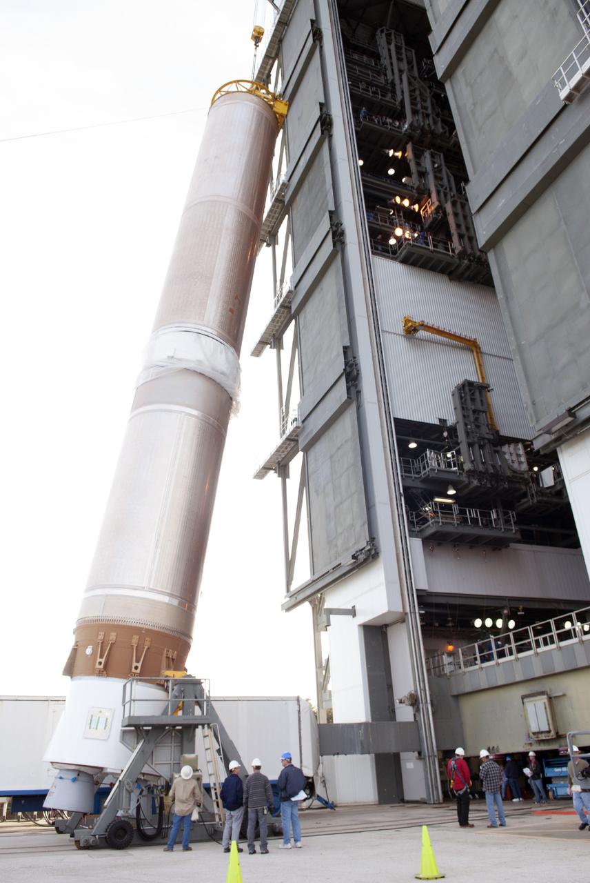 CAPE CANAVERAL, Fla. – At Cape Canaveral Air Force Station, the first stage of the United Launch Alliance Atlas V rocket is lifted for stacking in the Vertical Integration Facility at Launch Complex 41. The vehicle will be used to boost the Tracking and Data Relay Satellite, or TDRS-L, spacecraft to orbit. TDRS-L is the second of three next-generation satellites designed to ensure vital operational continuity for the NASA Space Network. It is scheduled to launch from Cape Canaveral's Space Launch Complex 41 atop an Atlas V rocket in January 2014. The current Tracking and Data Relay Satellite system consists of eight in-orbit satellites distributed to provide near continuous information relay service to missions such as the Hubble Space Telescope and International Space Station. For more information, visit: http://www.nasa.gov/content/tracking-and-data-relay-satellite-tdrs/ Photo credit: NASA/Charisse Nahser