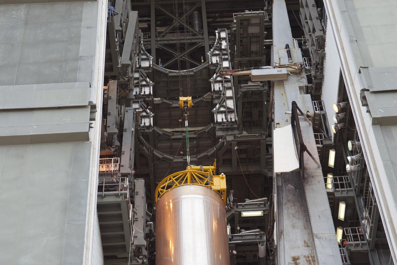 CAPE CANAVERAL, Fla. – At Cape Canaveral Air Force Station, the first stage of the United Launch Alliance Atlas V rocket positioned in the Vertical Integration Facility at Launch Complex 41. The vehicle will be used to boost the Tracking and Data Relay Satellite, or TDRS-L, spacecraft to orbit. TDRS-L is the second of three next-generation satellites designed to ensure vital operational continuity for the NASA Space Network. It is scheduled to launch from Cape Canaveral's Space Launch Complex 41 atop an Atlas V rocket in January 2014. The current Tracking and Data Relay Satellite system consists of eight in-orbit satellites distributed to provide near continuous information relay service to missions such as the Hubble Space Telescope and International Space Station. For more information, visit: http://www.nasa.gov/content/tracking-and-data-relay-satellite-tdrs/ Photo credit: NASA/Charisse Nahser