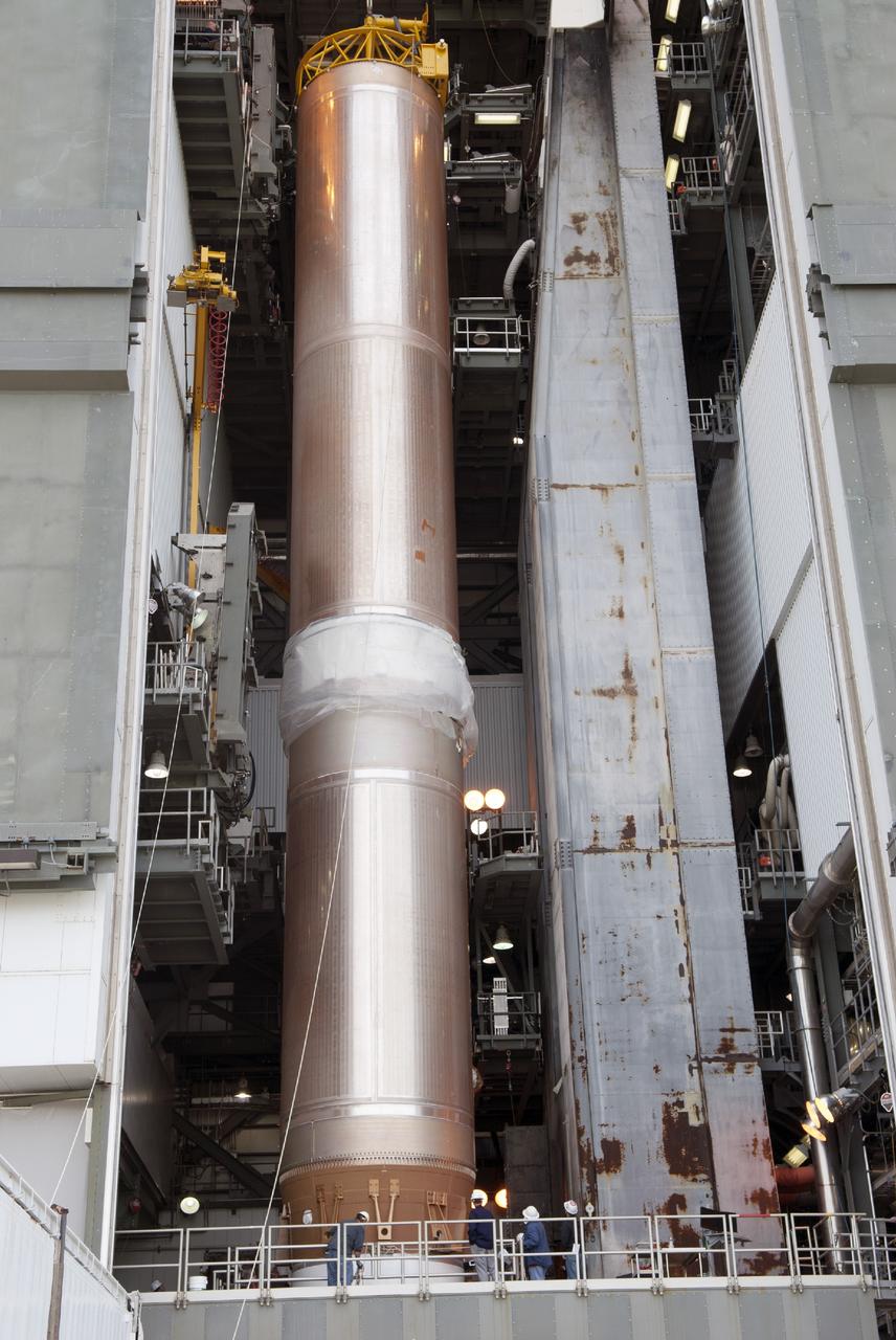 CAPE CANAVERAL, Fla. – At Cape Canaveral Air Force Station, the first stage of the United Launch Alliance Atlas V rocket positioned in the Vertical Integration Facility at Launch Complex 41. The vehicle will be used to boost the Tracking and Data Relay Satellite, or TDRS-L, spacecraft to orbit. TDRS-L is the second of three next-generation satellites designed to ensure vital operational continuity for the NASA Space Network. It is scheduled to launch from Cape Canaveral's Space Launch Complex 41 atop an Atlas V rocket in January 2014. The current Tracking and Data Relay Satellite system consists of eight in-orbit satellites distributed to provide near continuous information relay service to missions such as the Hubble Space Telescope and International Space Station. For more information, visit: http://www.nasa.gov/content/tracking-and-data-relay-satellite-tdrs/ Photo credit: NASA/Charisse Nahser