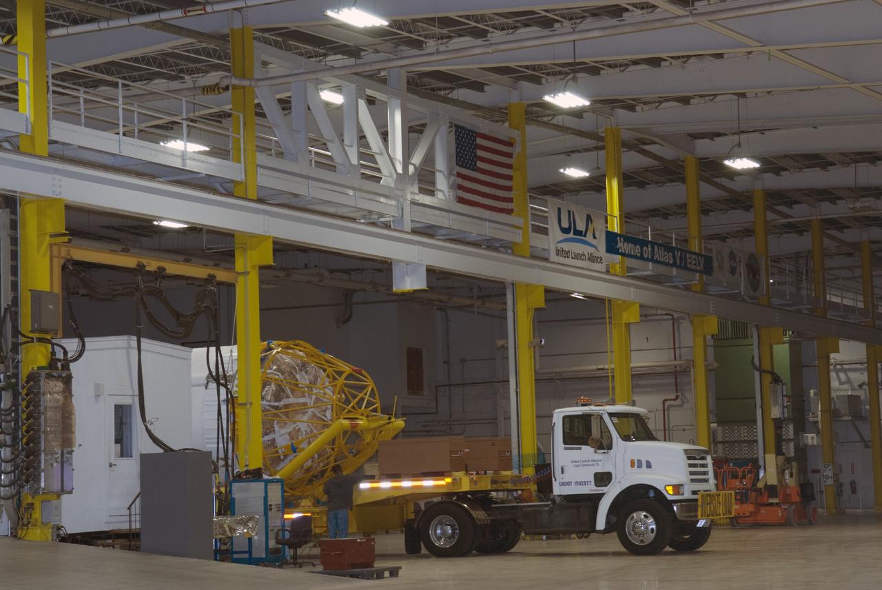 CAPE CANAVERAL, Fla. – The United Launch Alliance Centaur second stage that will help boost the Tracking and Data Relay Satellite, or TDRS-L, spacecraft into orbit is being transported from the hangar at the Atlas Spaceflight Operations Center on Cape Canaveral Air Force Station to Launch Complex 41. TDRS-L is the second of three next-generation satellites designed to ensure vital operational continuity for the NASA Space Network. It is scheduled to launch from Cape Canaveral's Space Launch Complex 41 atop an Atlas V rocket in January 2014. The current Tracking and Data Relay Satellite system consists of eight in-orbit satellites distributed to provide near continuous information relay service to missions such as the Hubble Space Telescope and International Space Station. For more information, visit: http://www.nasa.gov/content/tracking-and-data-relay-satellite-tdrs/ Photo credit: NASA/Charisse Nahser