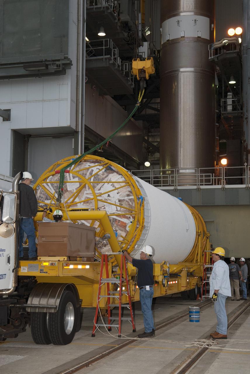 CAPE CANAVERAL, Fla. – At Cape Canaveral Air Force Station's Launch Complex 41, engineers and technicians support preparations for lifting the Centaur second stage of the United Launch Alliance rocket that will be used to boost the Tracking and Data Relay Satellite, or TDRS-L, spacecraft to orbit. TDRS-L is the second of three next-generation satellites designed to ensure vital operational continuity for the NASA Space Network. It is scheduled to launch from Cape Canaveral's Space Launch Complex 41 atop an Atlas V rocket in January 2014. The current Tracking and Data Relay Satellite system consists of eight in-orbit satellites distributed to provide near continuous information relay service to missions such as the Hubble Space Telescope and International Space Station. For more information, visit: http://www.nasa.gov/content/tracking-and-data-relay-satellite-tdrs/ Photo credit: NASA/Charisse Nahser