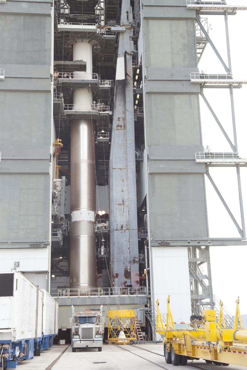 CAPE CANAVERAL, Fla. – At Cape Canaveral Air Force Station's Launch Complex 41, a United Launch Alliance Atlas V rocket, with its Centaur second stage atop, stands in the Vertical Integration Facility as preparations continue for lift off of the Tracking and Data Relay Satellite, or TDRS-L. TDRS-L is the second of three next-generation satellites designed to ensure vital operational continuity for the NASA Space Network. It is scheduled to launch from Cape Canaveral's Space Launch Complex 41 atop an Atlas V rocket in January 2014. The current Tracking and Data Relay Satellite system consists of eight in-orbit satellites distributed to provide near continuous information relay service to missions such as the Hubble Space Telescope and International Space Station. For more information, visit: http://www.nasa.gov/content/tracking-and-data-relay-satellite-tdrs/ Photo credit: NASA/Charisse Nahser