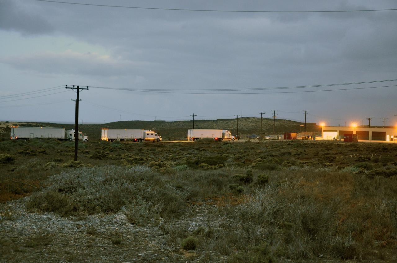 VANDENBERG AIR FORCE BASE, Calif. -- A convoy of trucks delivers solid rocket motors for a United Launch Alliance Delta II rocket to Vandenberg Air Force Base in California. The Delta II is slated to launch NASA's Orbiting Carbon Observatory-2, or OCO-2 spacecraft in July 2014.      OCO-2 will collect precise global measurements of carbon dioxide in the Earth's atmosphere. Scientists will analyze this data to improve our understanding of the natural processes and human activities that regulate the abundance and distribution of this important atmospheric gas.  Photo credit: NASA/Randy Beaudoin