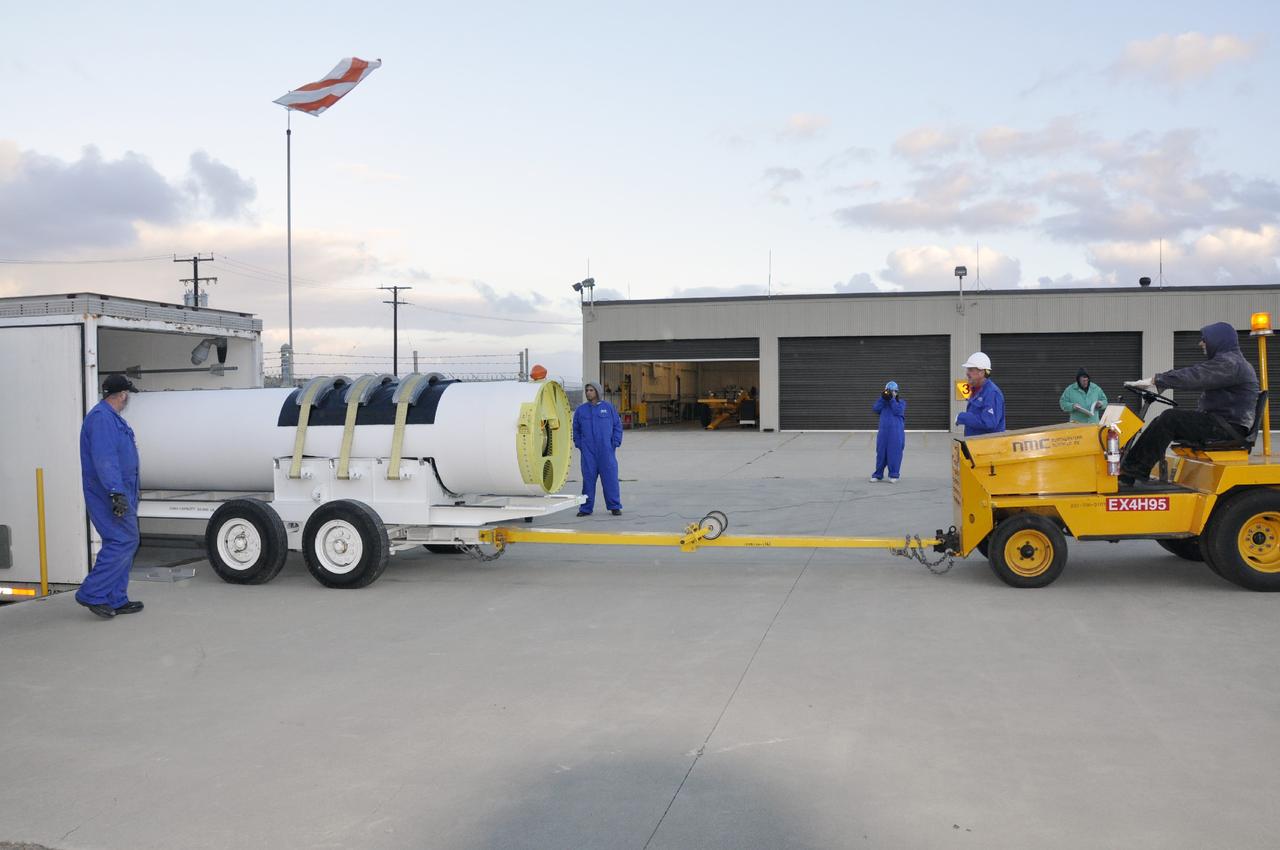 VANDENBERG AIR FORCE BASE, Calif. -- A solid rocket motor is carefully removed from its delivery truck at Vandenberg Air Force Base in California. The motor will be attached to the United Launch Alliance Delta II rocket slated to launch NASA's Orbiting Carbon Observatory-2, or OCO-2, spacecraft in July 2014.      OCO-2 will collect precise global measurements of carbon dioxide  in the Earth's atmosphere. Scientists will analyze this data to improve our understanding of the natural processes and human activities that regulate the abundance and distribution of this important atmospheric gas.  Photo credit: NASA/Randy Beaudoin