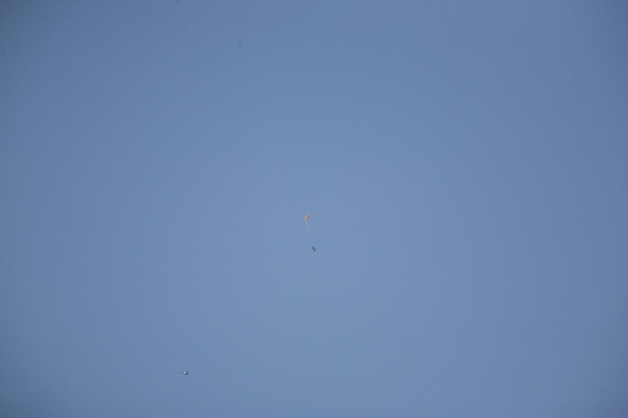 MORRO BAY, Calif. – Drogue chutes open above Dragon test article during a test to evaluate the spacecraft's parachute deployment system. The drogue chutes stabilized the vehicle, in preparation for main chute deployment as part of a milestone under SpaceX's Commercial Crew Integrated Capability agreement with NASA's Commercial Crew Program. Photo credit: NASA/Kim Shiflett