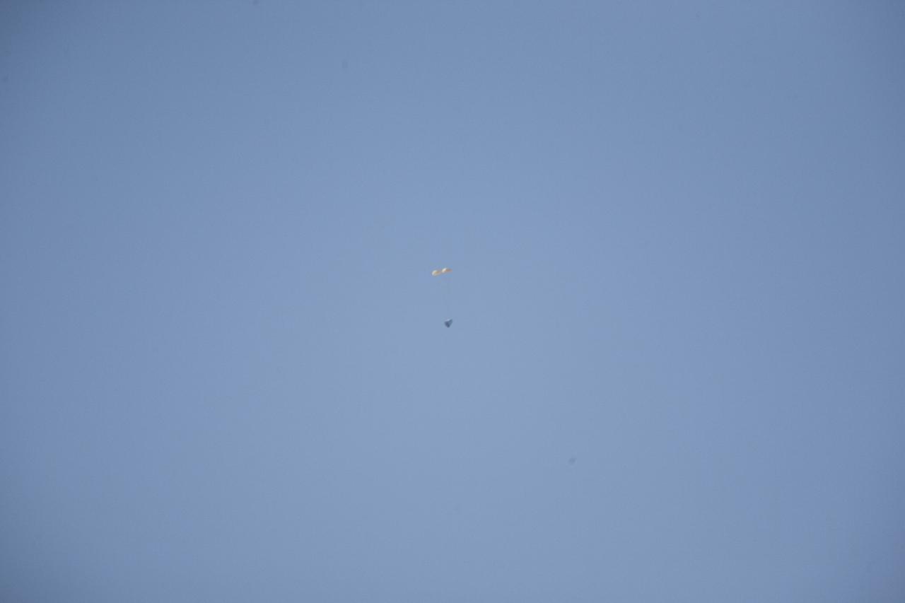 MORRO BAY, Calif. – Drogue chutes open above Dragon test article during a test to evaluate the spacecraft's parachute deployment system. The drogue chutes stabilized the vehicle, in preparation for main chute deployment as part of a milestone under SpaceX's Commercial Crew Integrated Capability agreement with NASA's Commercial Crew Program. Photo credit: NASA/Kim Shiflett