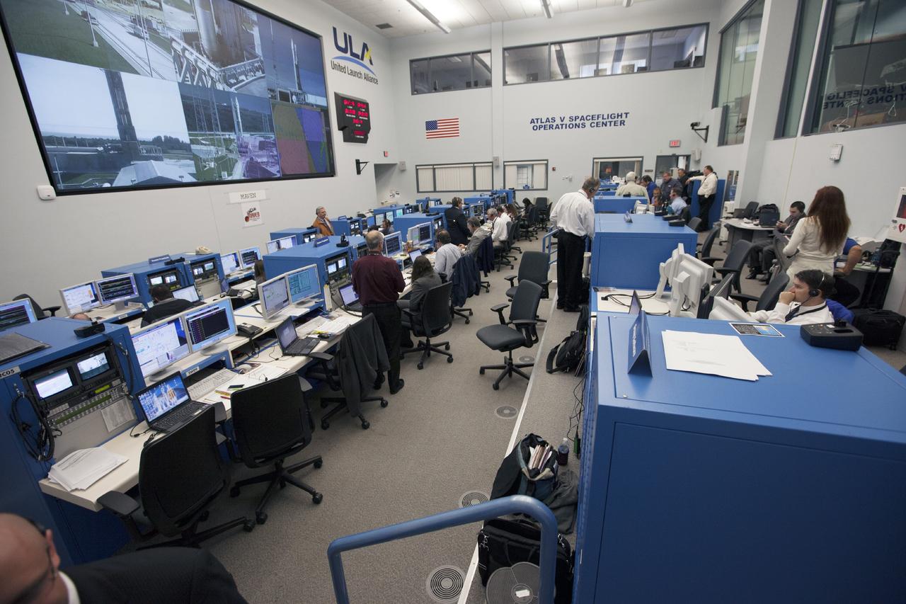 CAPE CANAVERAL, Fla. – At Cape Canaveral Air Force Station's Atlas V Spaceflight Operations Center NASA and contractor managers and engineers monitor progress of the countdown for the launch the agency's Mars Atmosphere and Volatile Evolution, or MAVEN, spacecraft.    MAVEN was launched on Nov. 18, 2013 from Cape Canaveral's Space Launch Complex 41 atop a United Launch Alliance Atlas V rocket. Positioned in an orbit above the Red Planet, MAVEN will study the upper atmosphere of Mars in unprecedented detail. For more information, visit: http://www.nasa.gov/mission_pages/maven/main/index.html Photo credit: NASA/Kim Shiflett