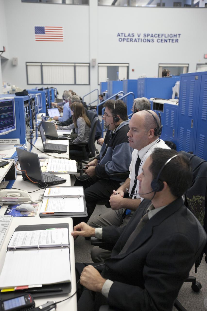 CAPE CANAVERAL, Fla. – At Cape Canaveral Air Force Station's Atlas V Spaceflight Operations Center NASA and contractor managers and engineers monitor progress of the countdown for the launch the agency's Mars Atmosphere and Volatile Evolution, or MAVEN, spacecraft.    MAVEN was launched on Nov. 18, 2013 from Cape Canaveral's Space Launch Complex 41 atop a United Launch Alliance Atlas V rocket. Positioned in an orbit above the Red Planet, MAVEN will study the upper atmosphere of Mars in unprecedented detail. For more information, visit: http://www.nasa.gov/mission_pages/maven/main/index.html Photo credit: NASA/Kim Shiflett