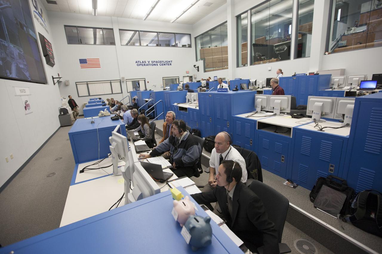 CAPE CANAVERAL, Fla. – At Cape Canaveral Air Force Station's Atlas V Spaceflight Operations Center NASA and contractor managers and engineers monitor progress of the countdown for the launch the agency's Mars Atmosphere and Volatile Evolution, or MAVEN, spacecraft.    MAVEN was launched on Nov. 18, 2013 from Cape Canaveral's Space Launch Complex 41 atop a United Launch Alliance Atlas V rocket. Positioned in an orbit above the Red Planet, MAVEN will study the upper atmosphere of Mars in unprecedented detail. For more information, visit: http://www.nasa.gov/mission_pages/maven/main/index.html Photo credit: NASA/Kim Shiflett