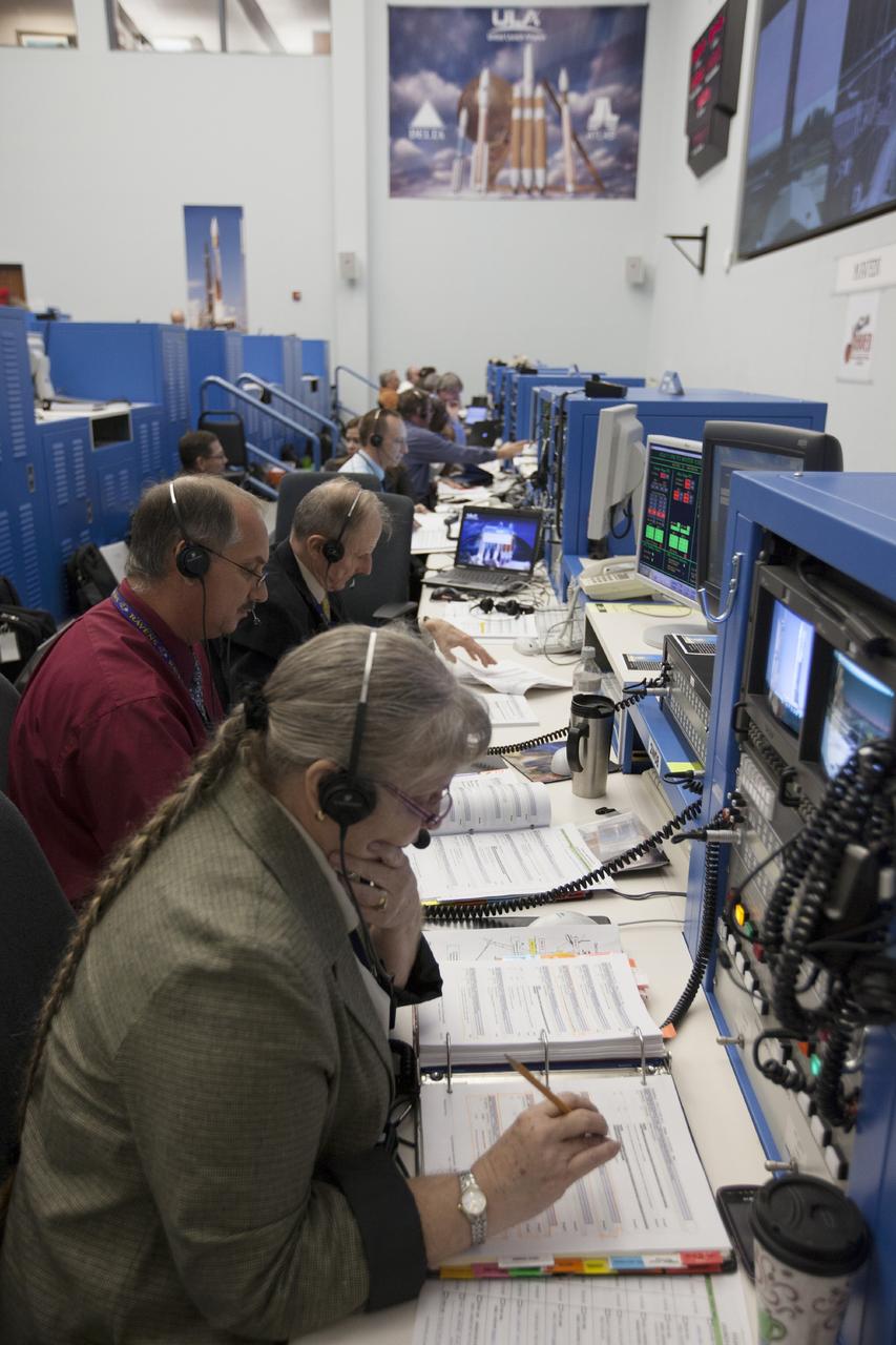 CAPE CANAVERAL, Fla. – At Cape Canaveral Air Force Station's Atlas V Spaceflight Operations Center NASA and contractor managers and engineers monitor progress of the countdown for the launch the agency's Mars Atmosphere and Volatile Evolution, or MAVEN, spacecraft.    MAVEN was launched on Nov. 18, 2013 from Cape Canaveral's Space Launch Complex 41 atop a United Launch Alliance Atlas V rocket. Positioned in an orbit above the Red Planet, MAVEN will study the upper atmosphere of Mars in unprecedented detail. For more information, visit: http://www.nasa.gov/mission_pages/maven/main/index.html Photo credit: NASA/Kim Shiflett