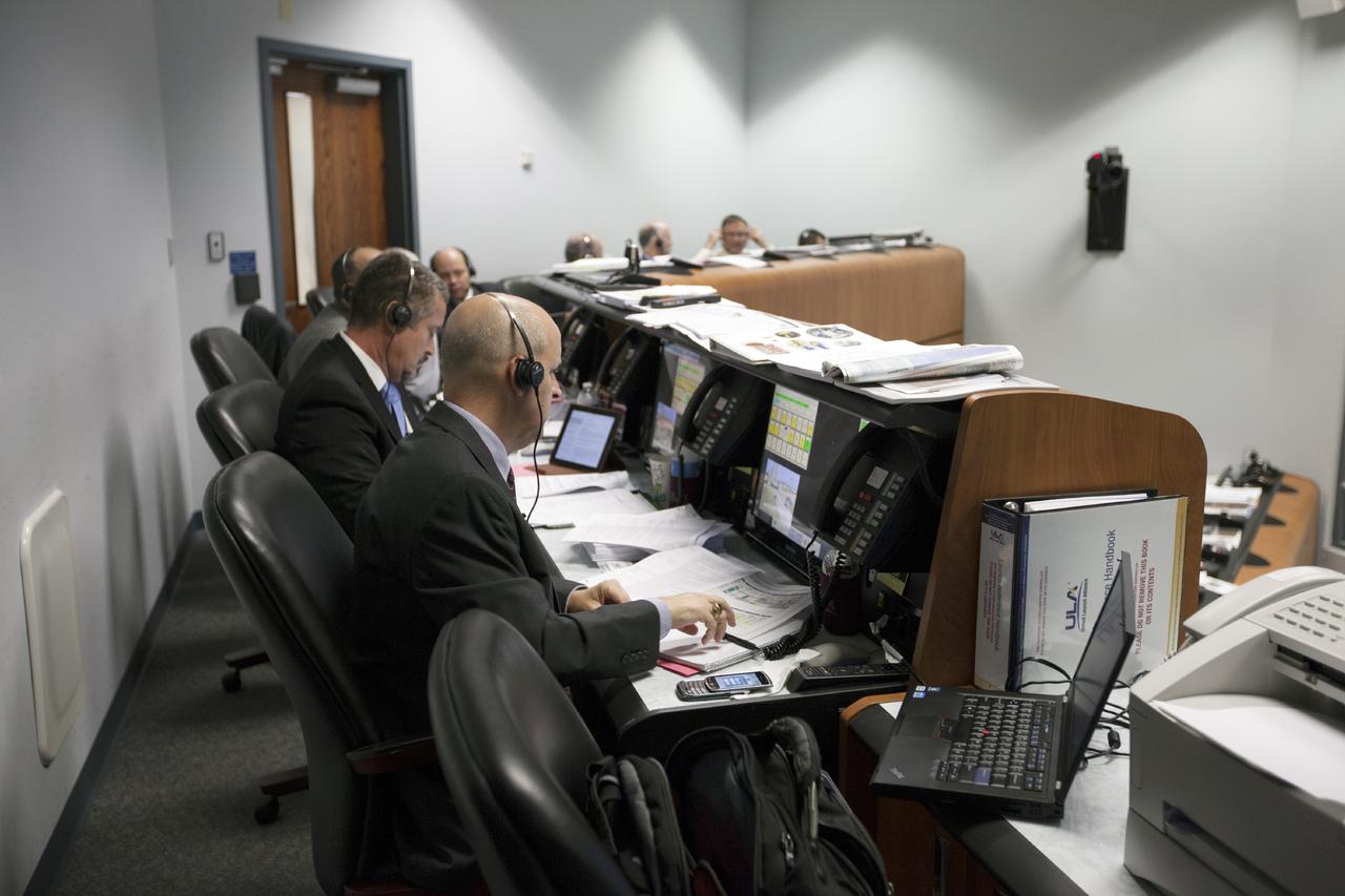 CAPE CANAVERAL, Fla. – At Cape Canaveral Air Force Station's Atlas V Spaceflight Operations Center NASA and contractor managers and engineers monitor progress of the countdown for the launch the agency's Mars Atmosphere and Volatile Evolution, or MAVEN, spacecraft.    MAVEN was launched on Nov. 18, 2013 from Cape Canaveral's Space Launch Complex 41 atop a United Launch Alliance Atlas V rocket. Positioned in an orbit above the Red Planet, MAVEN will study the upper atmosphere of Mars in unprecedented detail. For more information, visit: http://www.nasa.gov/mission_pages/maven/main/index.html Photo credit: NASA/Kim Shiflett