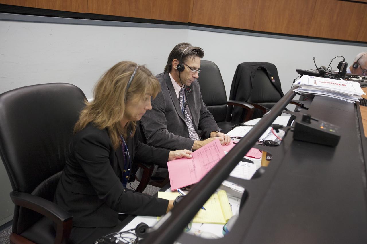 CAPE CANAVERAL, Fla. – At Cape Canaveral Air Force Station's Atlas V Spaceflight Operations Center NASA managers monitor progress of the countdown for the launch the agency's Mars Atmosphere and Volatile Evolution, or MAVEN, spacecraft. From the left are Amanda Mitskevich, program manager of NASA's Launch Services Program, or LSP, and Chuck Dovale, deputy program manager of LSP.      MAVEN was launched on Nov. 18, 2013 from Cape Canaveral's Space Launch Complex 41 atop a United Launch Alliance Atlas V rocket. Positioned in an orbit above the Red Planet, MAVEN will study the upper atmosphere of Mars in unprecedented detail. For more information, visit: http://www.nasa.gov/mission_pages/maven/main/index.html Photo credit: NASA/Kim Shiflett