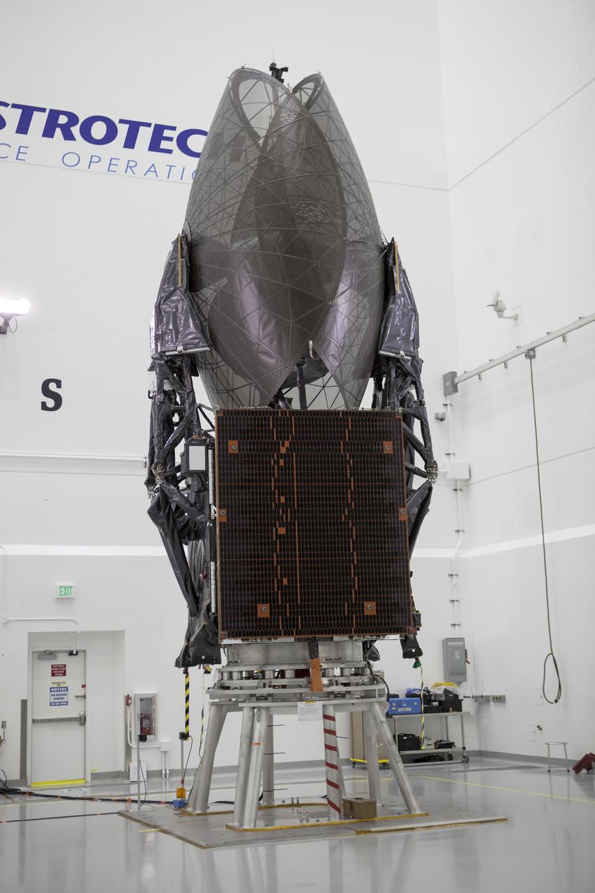 TITUSVILLE, Fla. – Members of the news media are given an opportunity for an up-close look at the Tracking and Data Relay Satellite, or TDRS-L, spacecraft undergoing preflight processing inside the Astrotech payload processing facility in Titusville. TDRS-L is being prepared for encapsulation inside its payload fairing prior to being transported to Launch Complex 41 at Cape Canaveral Air Force Station. Journalists visited Astrotech as part of TDRS-L Media Day to conduct interviews and photograph the satellite that will be a part of the second of three next-generation spacecraft designed to ensure vital operational continuity for the NASA Space Network. It is scheduled to launch from Cape Canaveral's Space Launch Complex 41 atop an Atlas V rocket in January 2014. The current Tracking and Data Relay Satellite system consists of eight in-orbit satellites distributed to provide near continuous information relay contact with orbiting spacecraft ranging from the International Space Station and Hubble Space Telescope to the array of scientific observatories. For more information, visit: http://www.nasa.gov/mission_pages/tdrs/home/index.html