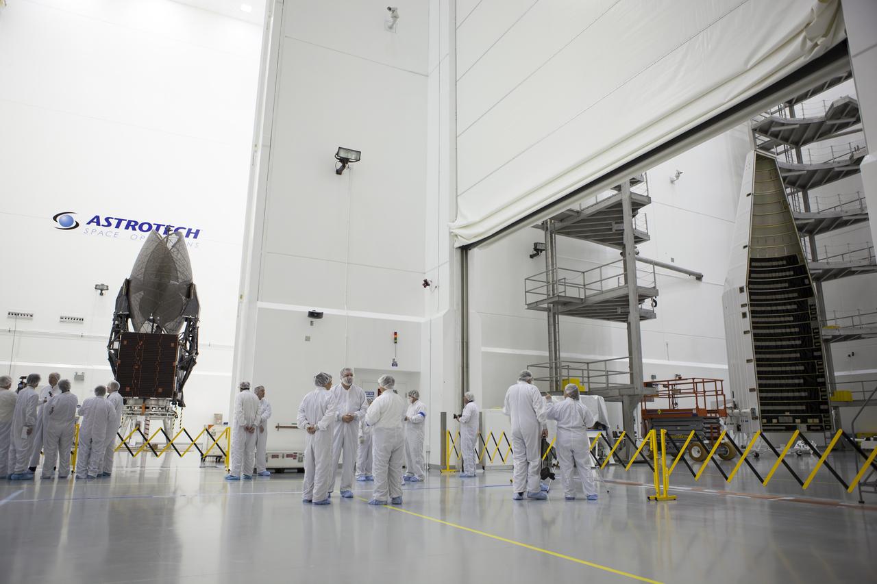 TITUSVILLE, Fla. – Members of the news media are given an up-close look at the Tracking and Data Relay Satellite, or TDRS-L, spacecraft undergoing preflight processing inside the Astrotech payload processing facility in Titusville. TDRS-L is being prepared for encapsulation inside its payload fairing prior to being transported to Launch Complex 41 at Cape Canaveral Air Force Station. Journalists visited Astrotech as part of TDRS-L Media Day to conduct interviews and photograph the satellite that will be a part of the second of three next-generation spacecraft designed to ensure vital operational continuity for the NASA Space Network. It is scheduled to launch from Cape Canaveral's Space Launch Complex 41 atop an Atlas V rocket in January 2014. The current Tracking and Data Relay Satellite system consists of eight in-orbit satellites distributed to provide near continuous information relay contact with orbiting spacecraft ranging from the International Space Station and Hubble Space Telescope to the array of scientific observatories. For more information, visit: http://www.nasa.gov/mission_pages/tdrs/home/index.html