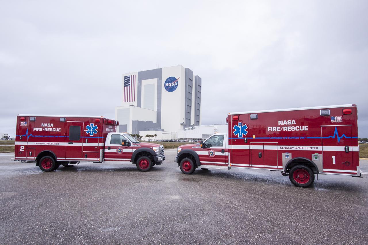 New Fire Department's  Emergency Response Trucks in front of VAB. (Not on web)