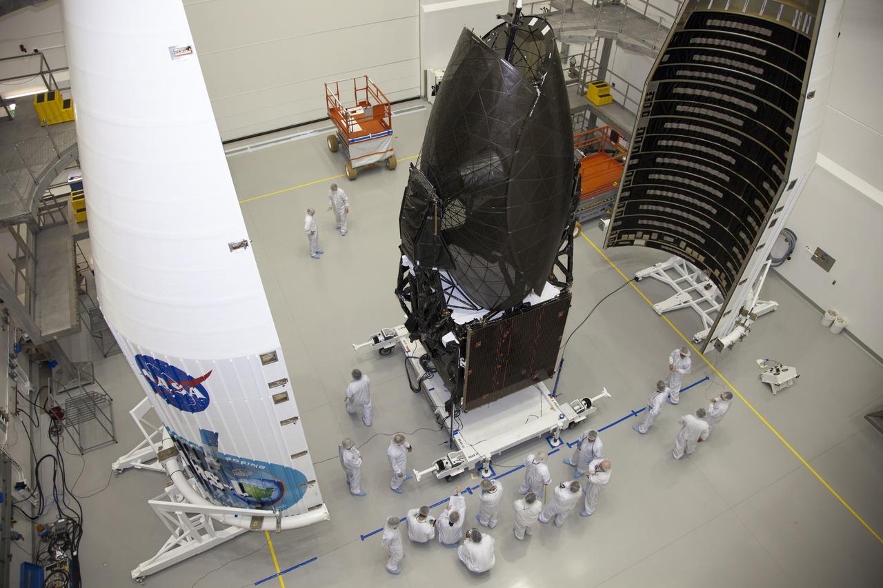 TITUSVILLE, Fla. – Inside the Astrotech payload processing facility in Titusville, the Tracking and Data Relay Satellite, or TDRS-L, spacecraft is being encapsulated in its payload fairing in preparation for begin transported to Launch Complex 41 at Cape Canaveral Air Force Station. The TDRS-L satellite will be a part of the second of three next-generation spacecraft designed to ensure vital operational continuity for the NASA Space Network. It is scheduled to launch from Cape Canaveral's Space Launch Complex 41 atop a United Launch Alliance Atlas V rocket on January 23, 2014. The current Tracking and Data Relay Satellite system consists of eight in-orbit satellites distributed to provide near continuous information relay contact with orbiting spacecraft ranging from the International Space Station and Hubble Space Telescope to the array of scientific observatories. For more information, visit: http://www.nasa.gov/mission_pages/tdrs/home/index.html