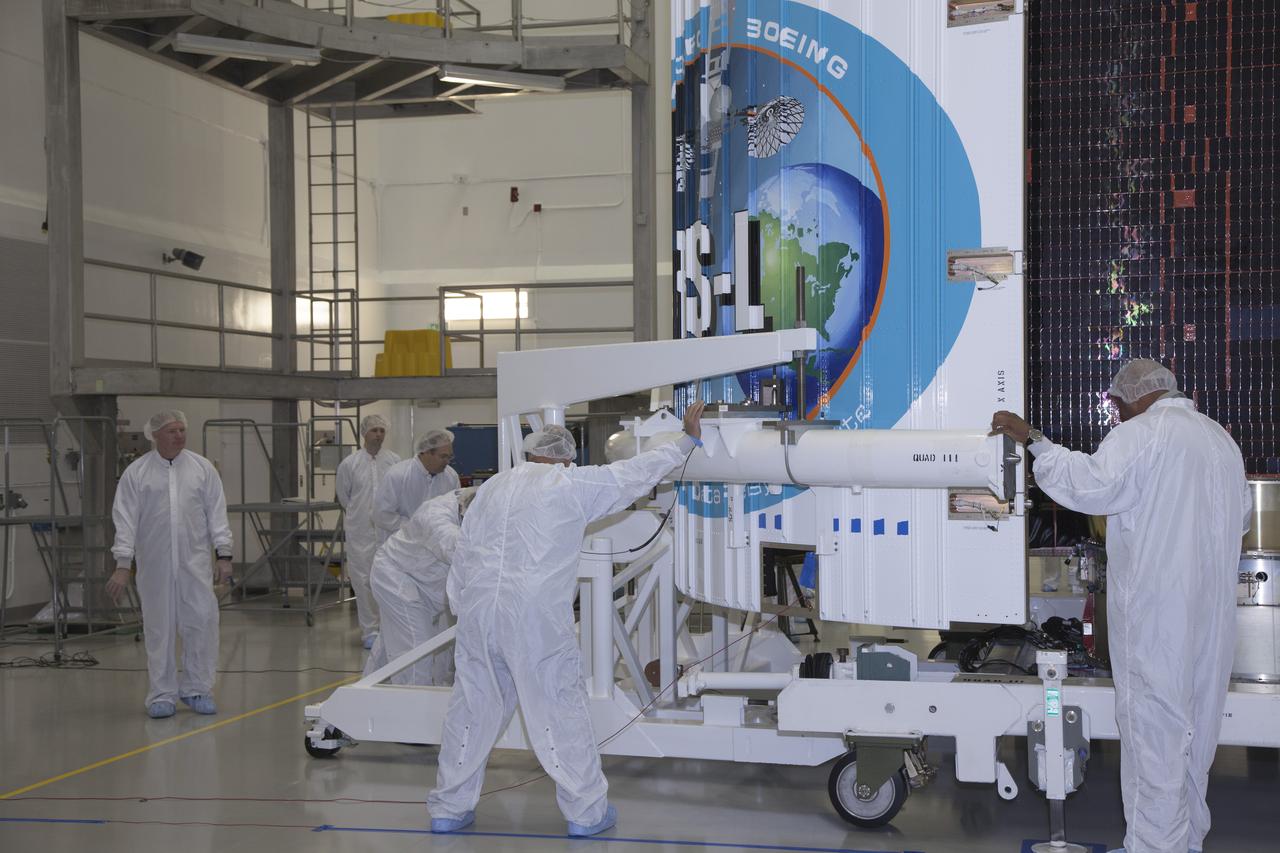 TITUSVILLE, Fla. – Inside the Astrotech payload processing facility in Titusville, United Launch Alliance engineers and technicians encapsulate the Tracking and Data Relay Satellite, or TDRS-L, spacecraft in its payload fairing. TDRS-L will then be transported to Launch Complex 41 at Cape Canaveral Air Force Station. The TDRS-L satellite will be a part of the second of three next-generation spacecraft designed to ensure vital operational continuity for the NASA Space Network. It is scheduled to launch from Cape Canaveral's Space Launch Complex 41 atop a United Launch Alliance Atlas V rocket on January 23, 2014. The current Tracking and Data Relay Satellite system consists of eight in-orbit satellites distributed to provide near continuous information relay contact with orbiting spacecraft ranging from the International Space Station and Hubble Space Telescope to the array of scientific observatories. For more information, visit: http://www.nasa.gov/mission_pages/tdrs/home/index.html