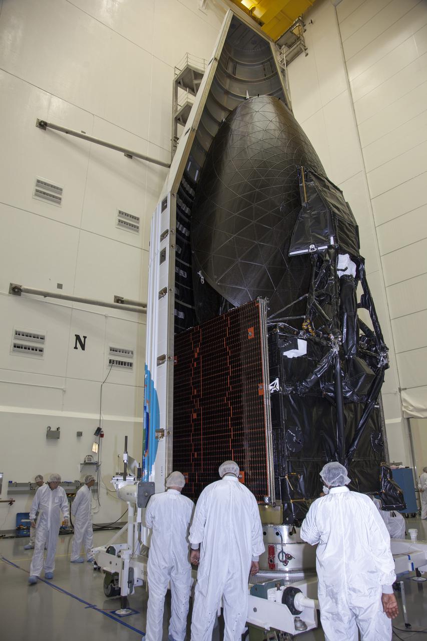 TITUSVILLE, Fla. – Inside the Astrotech payload processing facility in Titusville, United Launch Alliance engineers and technicians encapsulate the Tracking and Data Relay Satellite, or TDRS-L, spacecraft in its payload fairing. TDRS-L will then be transported to Launch Complex 41 at Cape Canaveral Air Force Station. The TDRS-L satellite will be a part of the second of three next-generation spacecraft designed to ensure vital operational continuity for the NASA Space Network. It is scheduled to launch from Cape Canaveral's Space Launch Complex 41 atop a United Launch Alliance Atlas V rocket on January 23, 2014. The current Tracking and Data Relay Satellite system consists of eight in-orbit satellites distributed to provide near continuous information relay contact with orbiting spacecraft ranging from the International Space Station and Hubble Space Telescope to the array of scientific observatories. For more information, visit: http://www.nasa.gov/mission_pages/tdrs/home/index.html