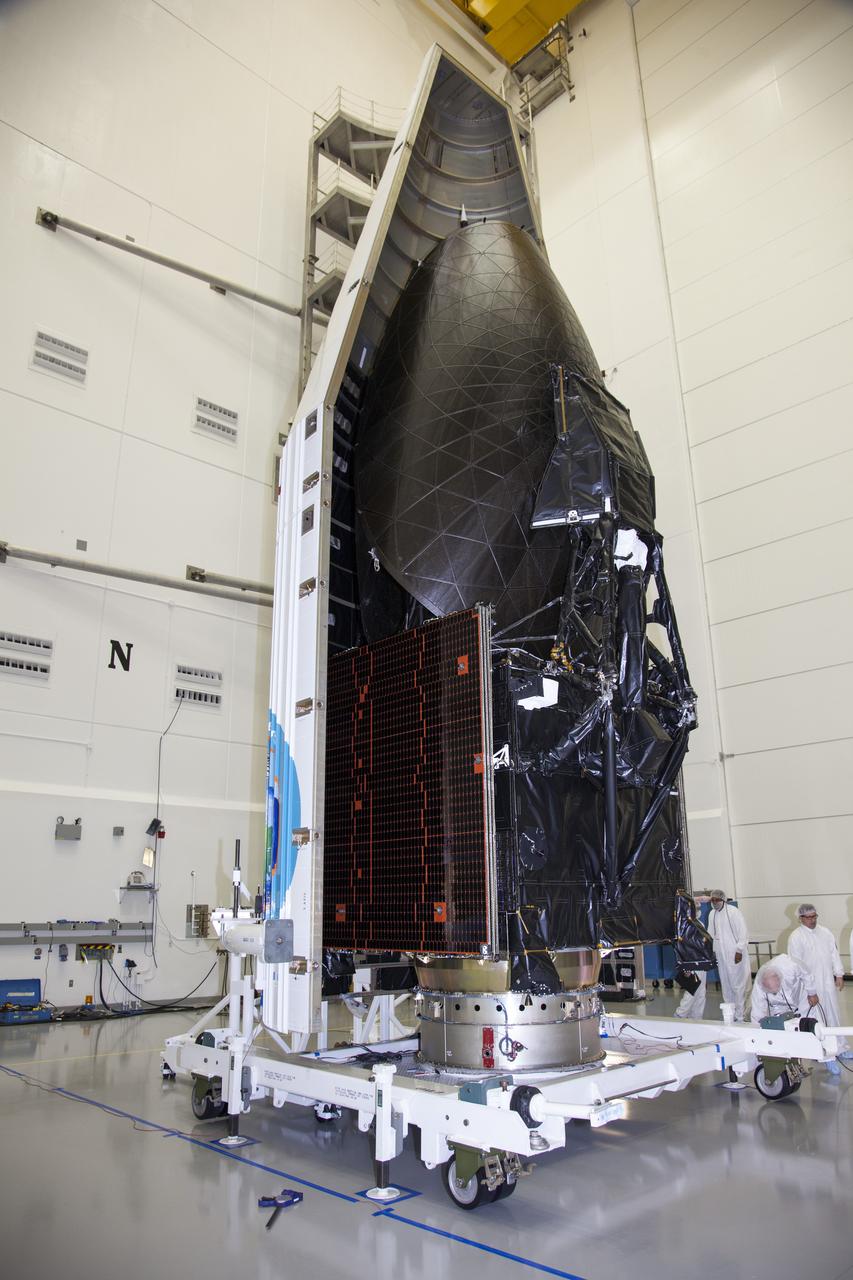 TITUSVILLE, Fla. – Inside the Astrotech payload processing facility in Titusville NASA's Tracking and Data Relay Satellite, or TDRS-L, spacecraft is being encapsulated in its payload fairing prior to being transported to Launch Complex 41 at Cape Canaveral Air Force Station. The TDRS-L satellite will be a part of the second of three next-generation spacecraft designed to ensure vital operational continuity for the NASA Space Network. It is scheduled to launch from Cape Canaveral's Space Launch Complex 41 atop a United Launch Alliance Atlas V rocket on January 23, 2014. The current Tracking and Data Relay Satellite system consists of eight in-orbit satellites distributed to provide near continuous information relay contact with orbiting spacecraft ranging from the International Space Station and Hubble Space Telescope to the array of scientific observatories. For more information, visit: http://www.nasa.gov/mission_pages/tdrs/home/index.html