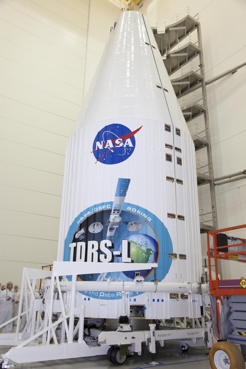 TITUSVILLE, Fla. – Inside the Astrotech payload processing facility in Titusville, NASA's Tracking and Data Relay Satellite, or TDRS-L, spacecraft has been encapsulated in its payload fairing. TDRS-L will then be transported to Launch Complex 41 at Cape Canaveral Air Force Station. The TDRS-L satellite will be a part of the second of three next-generation spacecraft designed to ensure vital operational continuity for the NASA Space Network. It is scheduled to launch from Cape Canaveral's Space Launch Complex 41 atop a United Launch Alliance Atlas V rocket on January 23, 2014. The current Tracking and Data Relay Satellite system consists of eight in-orbit satellites distributed to provide near continuous information relay contact with orbiting spacecraft ranging from the International Space Station and Hubble Space Telescope to the array of scientific observatories. For more information, visit: http://www.nasa.gov/mission_pages/tdrs/home/index.html