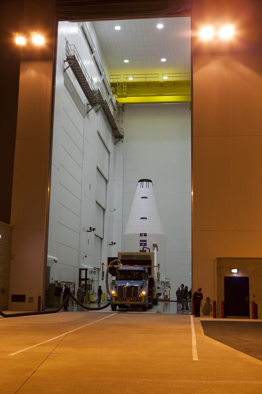 TITUSVILLE, Fla. – Encapsulated in its payload fairing, NASA's Tracking and Data Relay Satellite, or TDRS-L, spacecraft has been mounted on a transporter for its trip from the Astrotech payload processing facility in Titusville to Launch Complex 41 at Cape Canaveral Air Force Station. The TDRS-L satellite will be a part of the second of three next-generation spacecraft designed to ensure vital operational continuity for the NASA Space Network. It is scheduled to launch from Cape Canaveral's Space Launch Complex 41 atop a United Launch Alliance Atlas V rocket on January 23, 2014. The current Tracking and Data Relay Satellite system consists of eight in-orbit satellites distributed to provide near continuous information relay contact with orbiting spacecraft ranging from the International Space Station and Hubble Space Telescope to the array of scientific observatories. For more information, visit: http://www.nasa.gov/mission_pages/tdrs/home/index.html Photo credit: NASA/Dimitri Gerondidakis