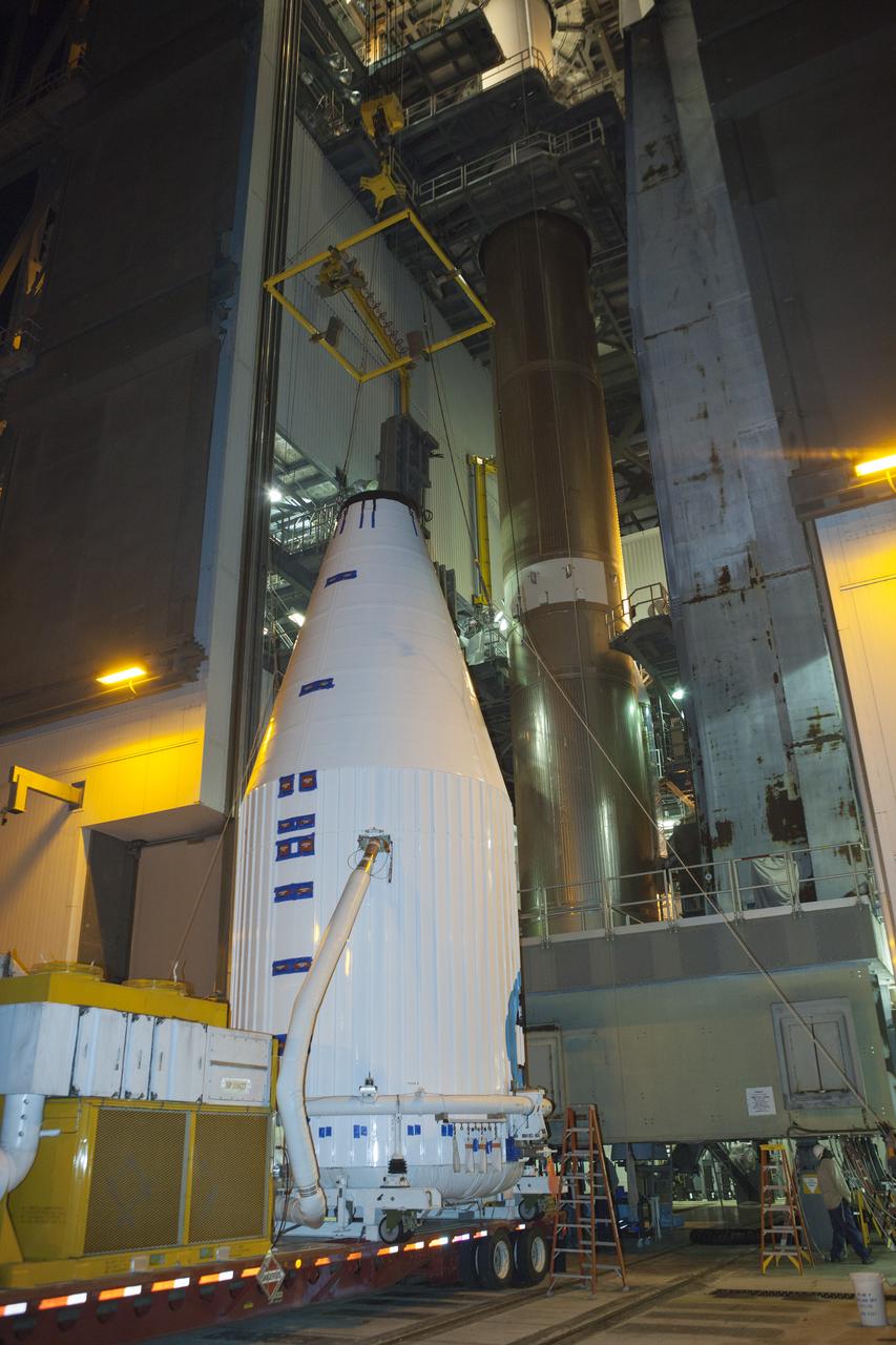 CAPE CANAVERAL, Fla. – At Cape Canaveral Air Force Station's Vertical Integration Facility at Launch Complex 41, engineers and technicians prepare to lift NASA's Tracking and Data Relay Satellite, or TDRS-L, spacecraft for mounting atop a United Launch Alliance Atlas V rocket. The TDRS-L satellite will be a part of the second of three next-generation spacecraft designed to ensure vital operational continuity for the NASA Space Network. It is scheduled to launch from Cape Canaveral's Space Launch Complex 41 atop a United Launch Alliance Atlas V rocket on Jan. 23, 2014. The current Tracking and Data Relay Satellite system consists of eight in-orbit satellites distributed to provide near continuous information relay contact with orbiting spacecraft ranging from the International Space Station and Hubble Space Telescope to the array of scientific observatories. For more information, visit: http://www.nasa.gov/mission_pages/tdrs/home/index.html Photo credit: NASA/Dimitri Gerondidakis