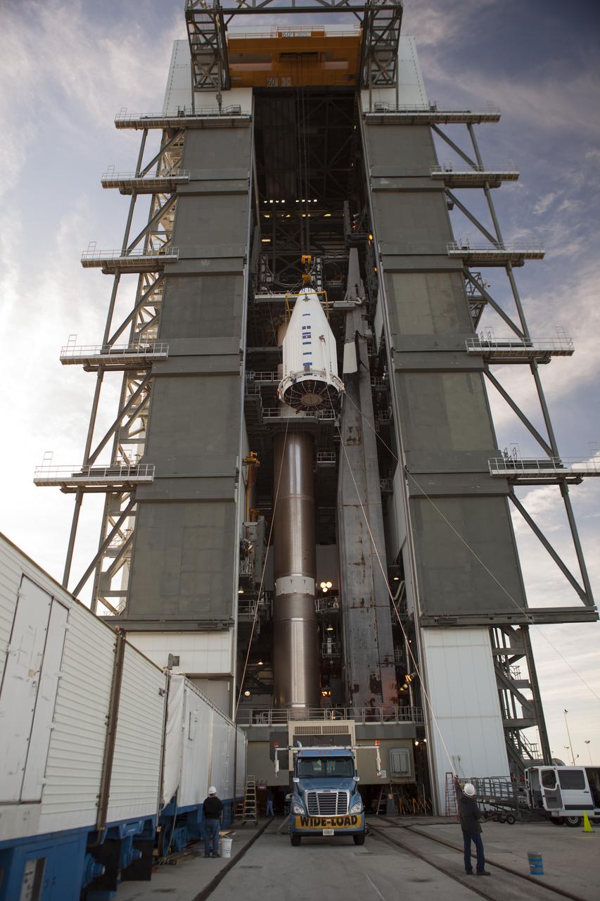 CAPE CANAVERAL, Fla. – At Cape Canaveral Air Force Station's Vertical Integration Facility at Launch Complex 41, NASA's Tracking and Data Relay Satellite, or TDRS-L, spacecraft is lifted for mounting atop a United Launch Alliance Atlas V rocket. The TDRS-L satellite will be a part of the second of three next-generation spacecraft designed to ensure vital operational continuity for the NASA Space Network. It is scheduled to launch from Cape Canaveral's Space Launch Complex 41 atop a United Launch Alliance Atlas V rocket on Jan. 23, 2014. The current Tracking and Data Relay Satellite system consists of eight in-orbit satellites distributed to provide near continuous information relay contact with orbiting spacecraft ranging from the International Space Station and Hubble Space Telescope to the array of scientific observatories. For more information, visit: http://www.nasa.gov/mission_pages/tdrs/home/index.html Photo credit: NASA/Dimitri Gerondidakis  